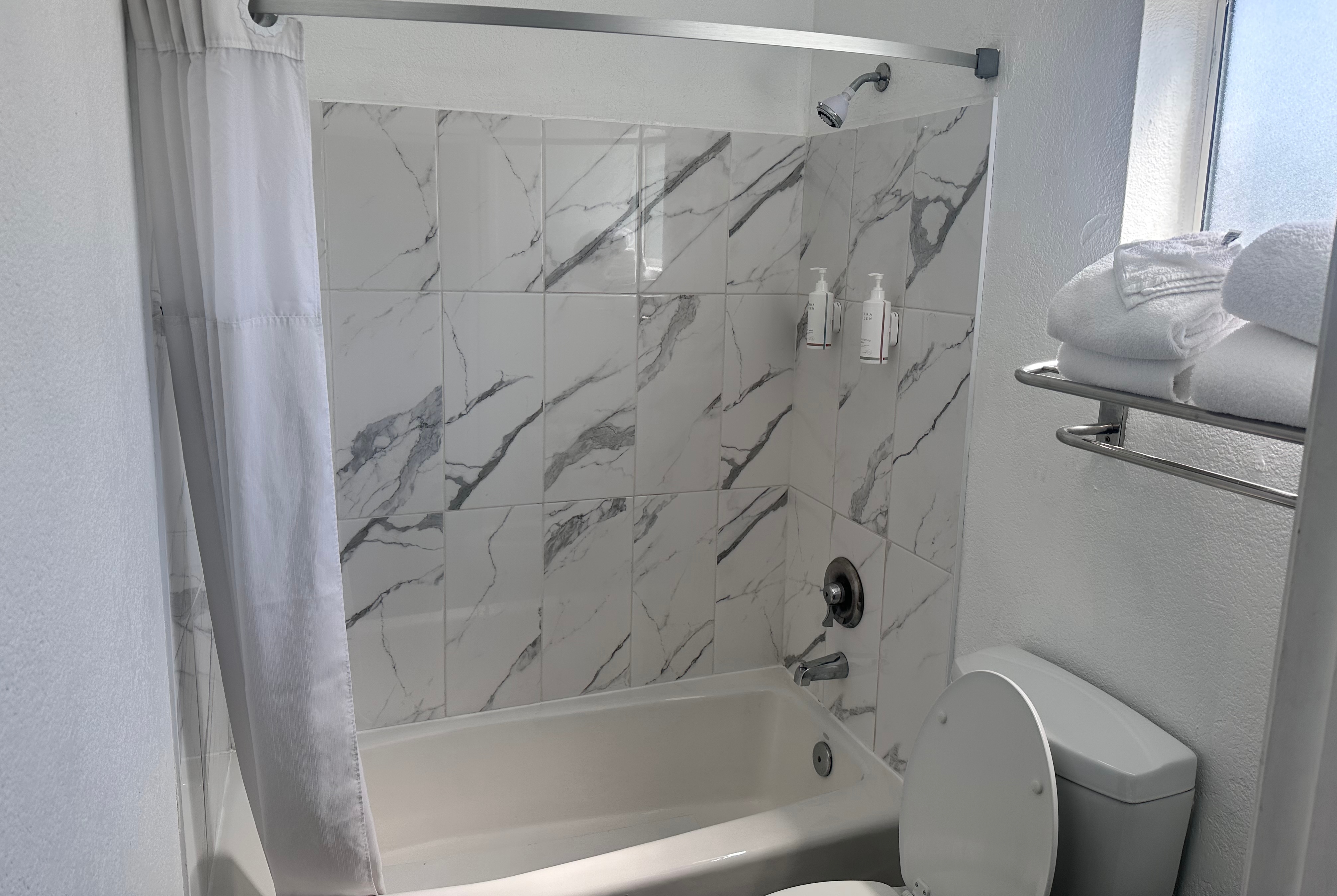 Guest room bath at the Days Inn by Wyndham Rocklin/Sacramento in Rocklin, California