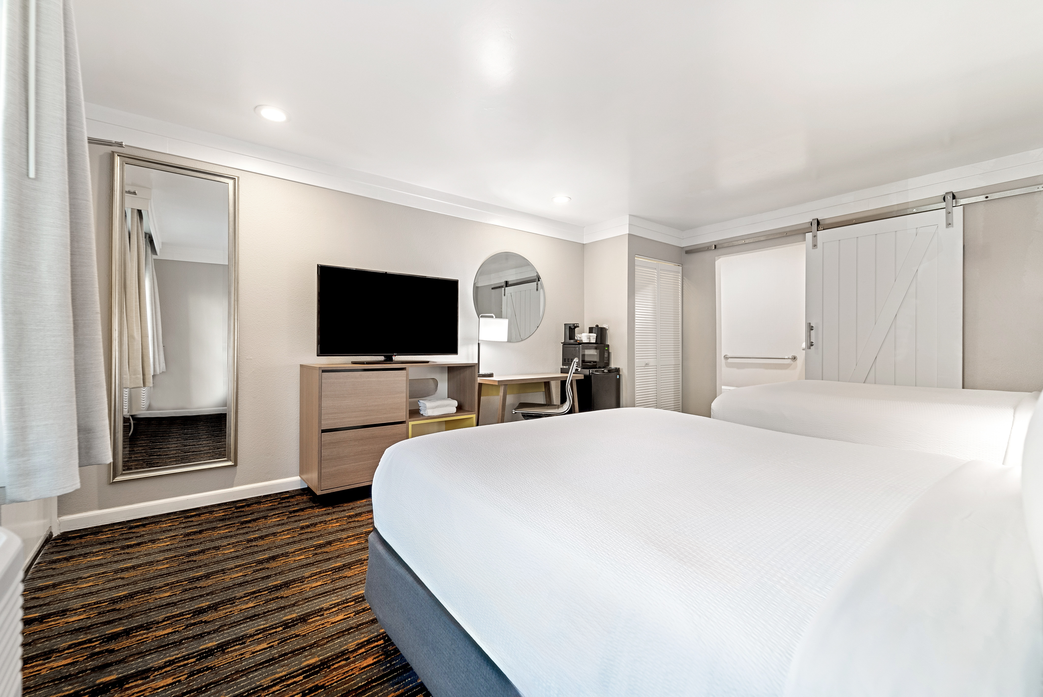 Guest room at the Days Inn by Wyndham San Diego Hotel Circle in San Diego, California