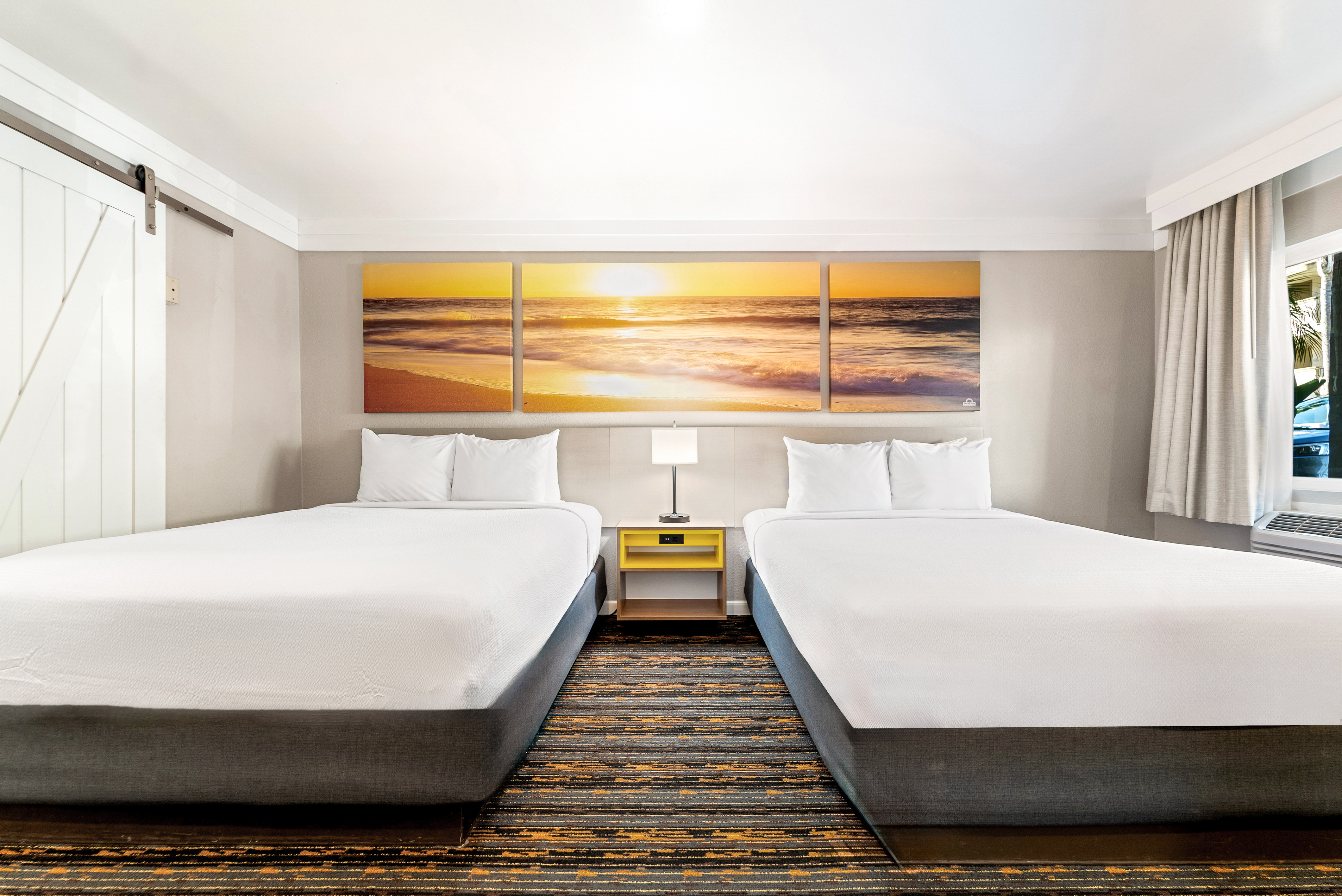 Guest room at the Days Inn by Wyndham San Diego Hotel Circle in San Diego, California