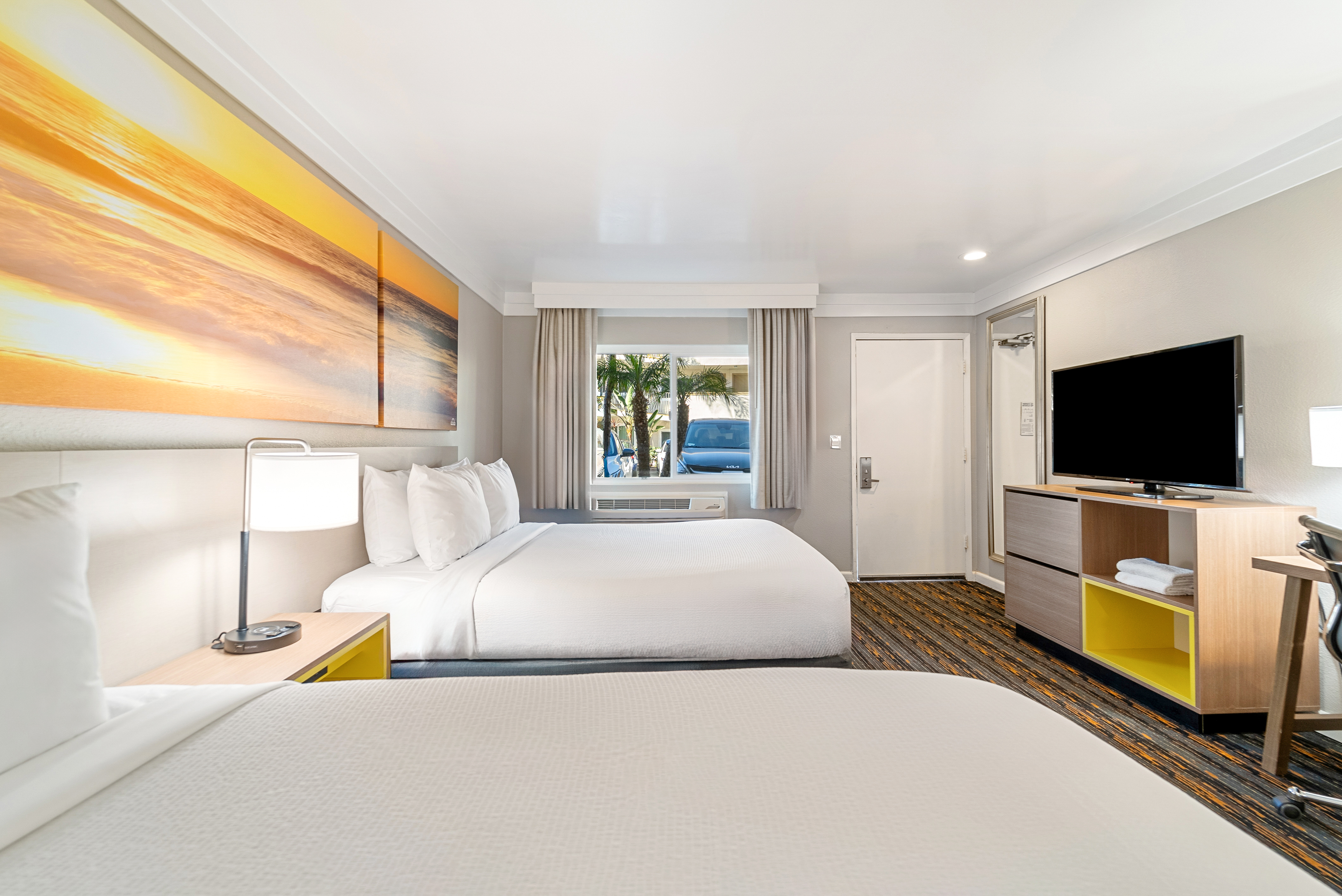 Guest room at the Days Inn by Wyndham San Diego Hotel Circle in San Diego, California