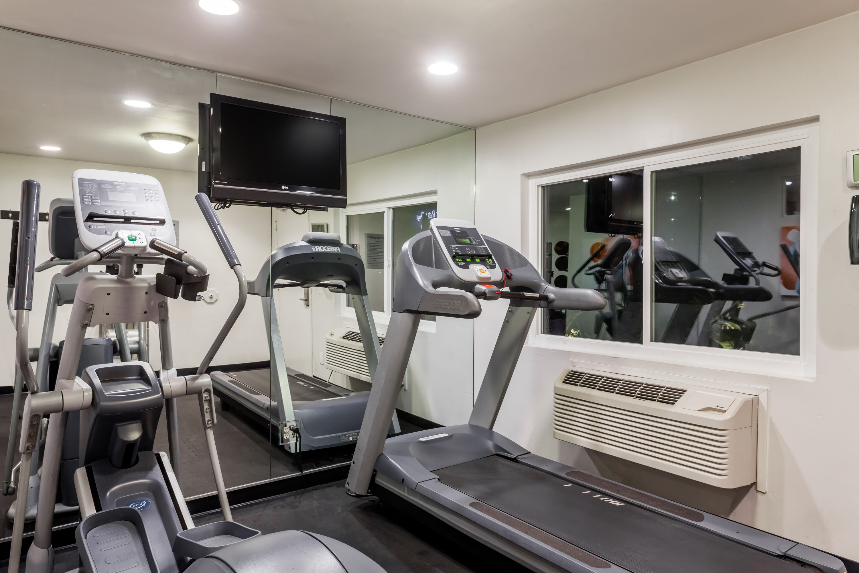 Fitness room at Days Inn by Wyndham San Diego Hotel Circle in San Diego, California