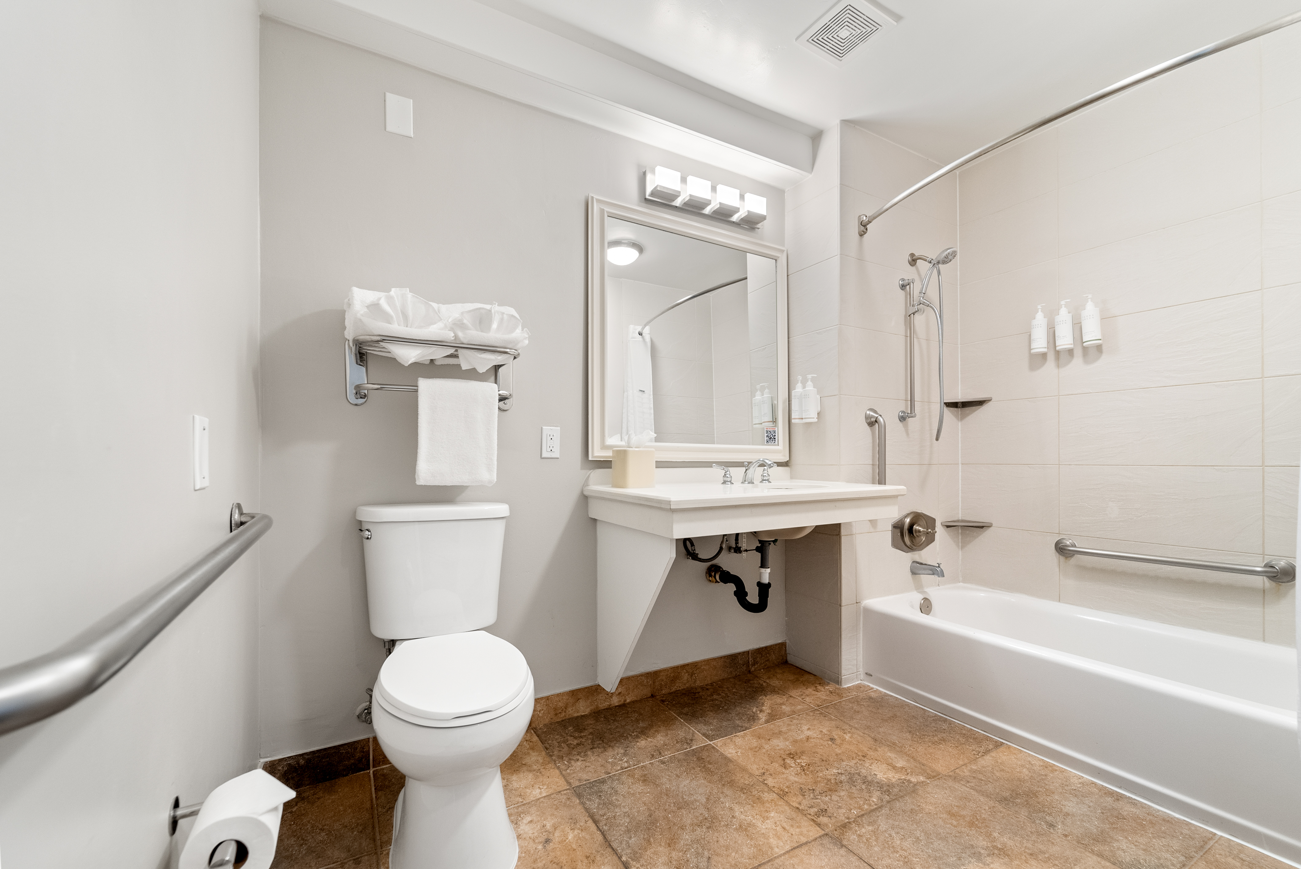 Guest room bath at the Days Inn by Wyndham San Diego Hotel Circle in San Diego, California