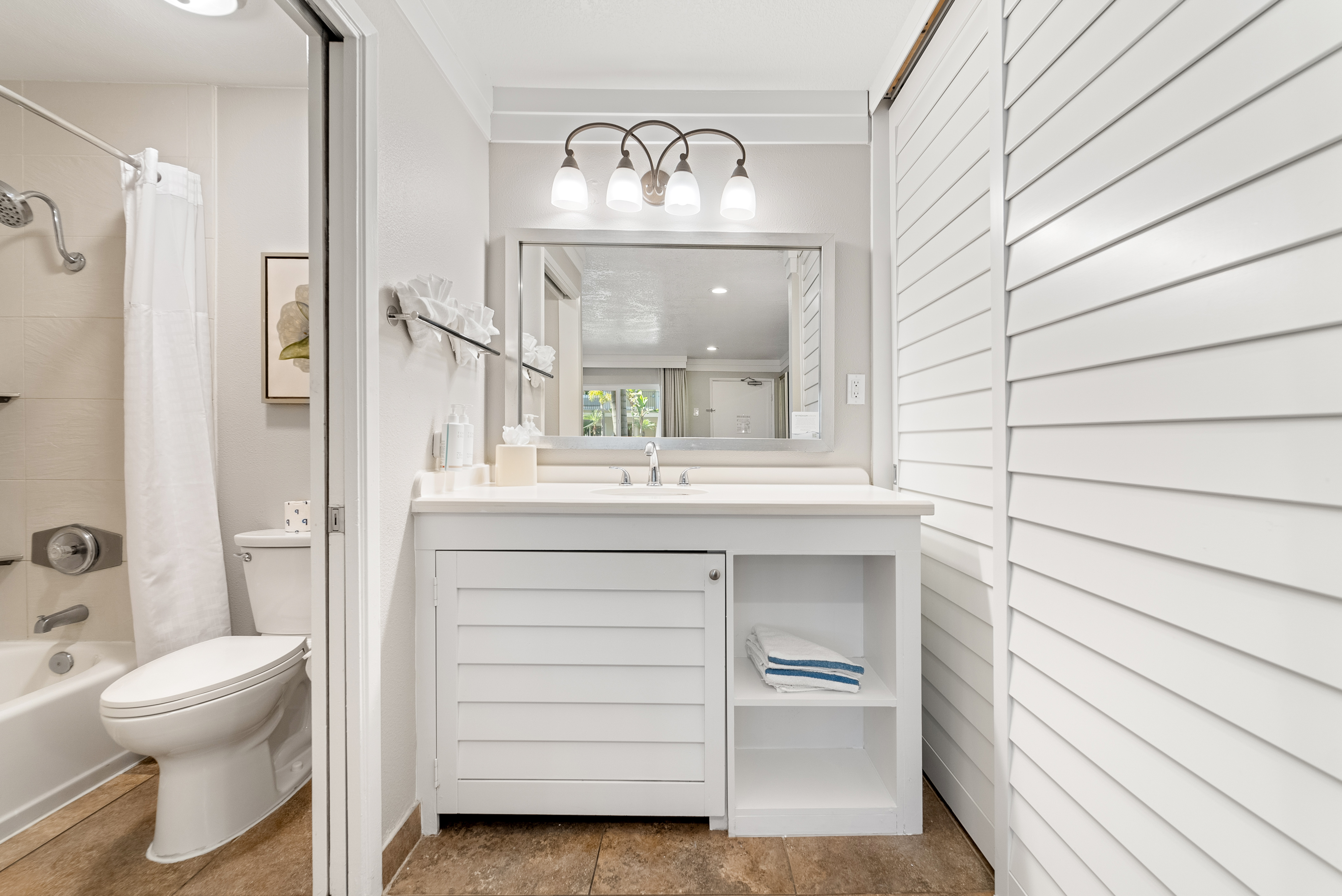 Guest room bath at the Days Inn by Wyndham San Diego Hotel Circle in San Diego, California
