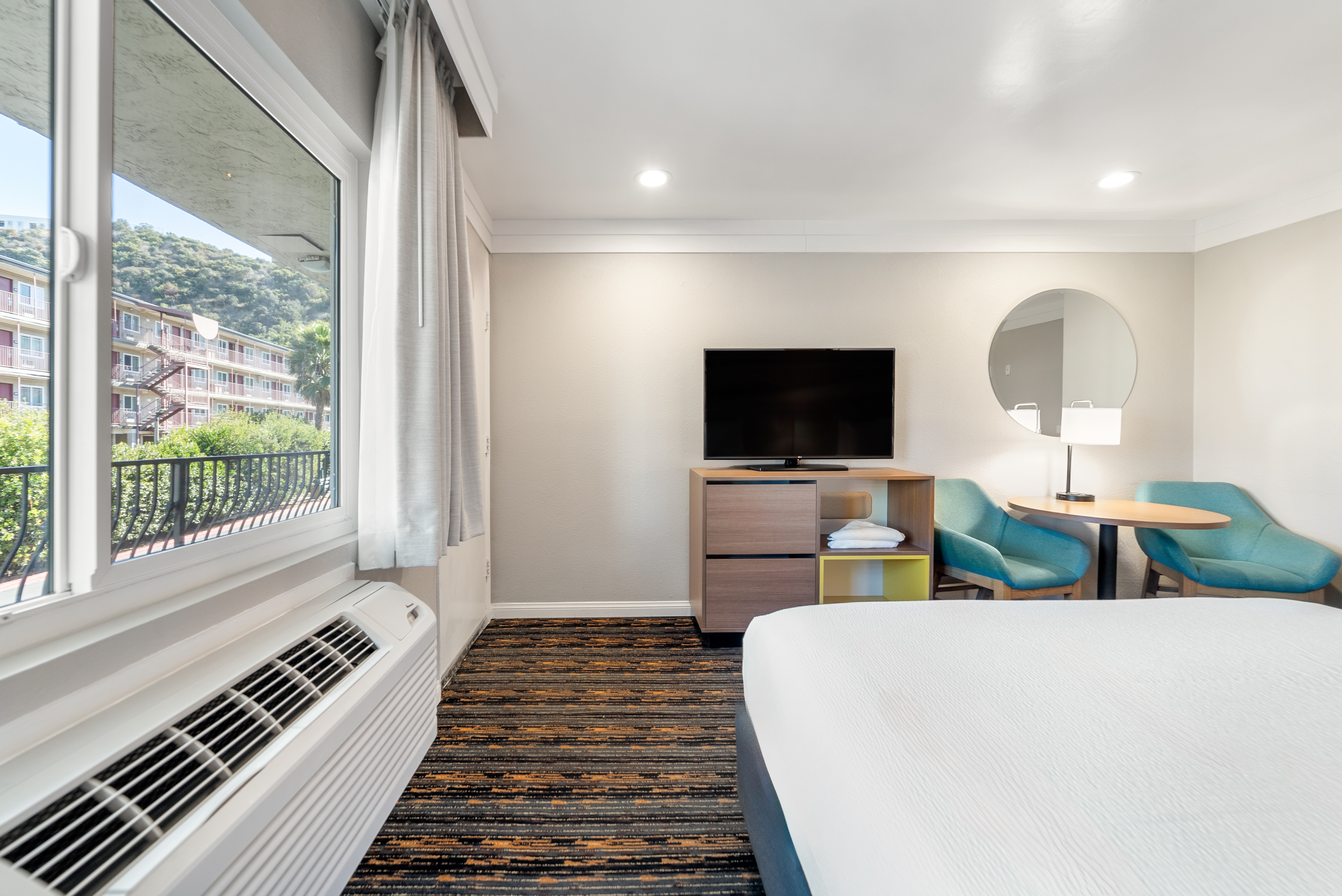 Guest room at the Days Inn by Wyndham San Diego Hotel Circle in San Diego, California