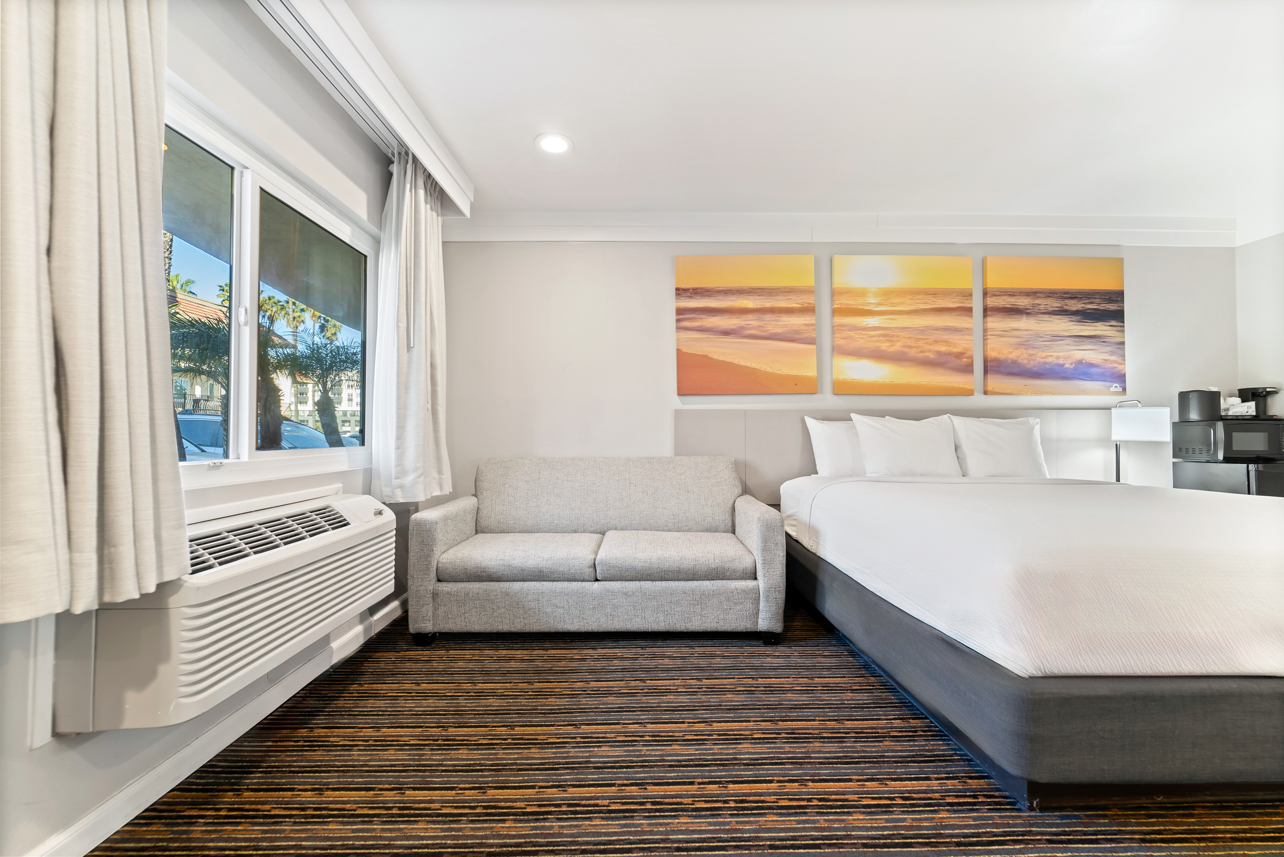 Guest room at the Days Inn by Wyndham San Diego Hotel Circle in San Diego, California