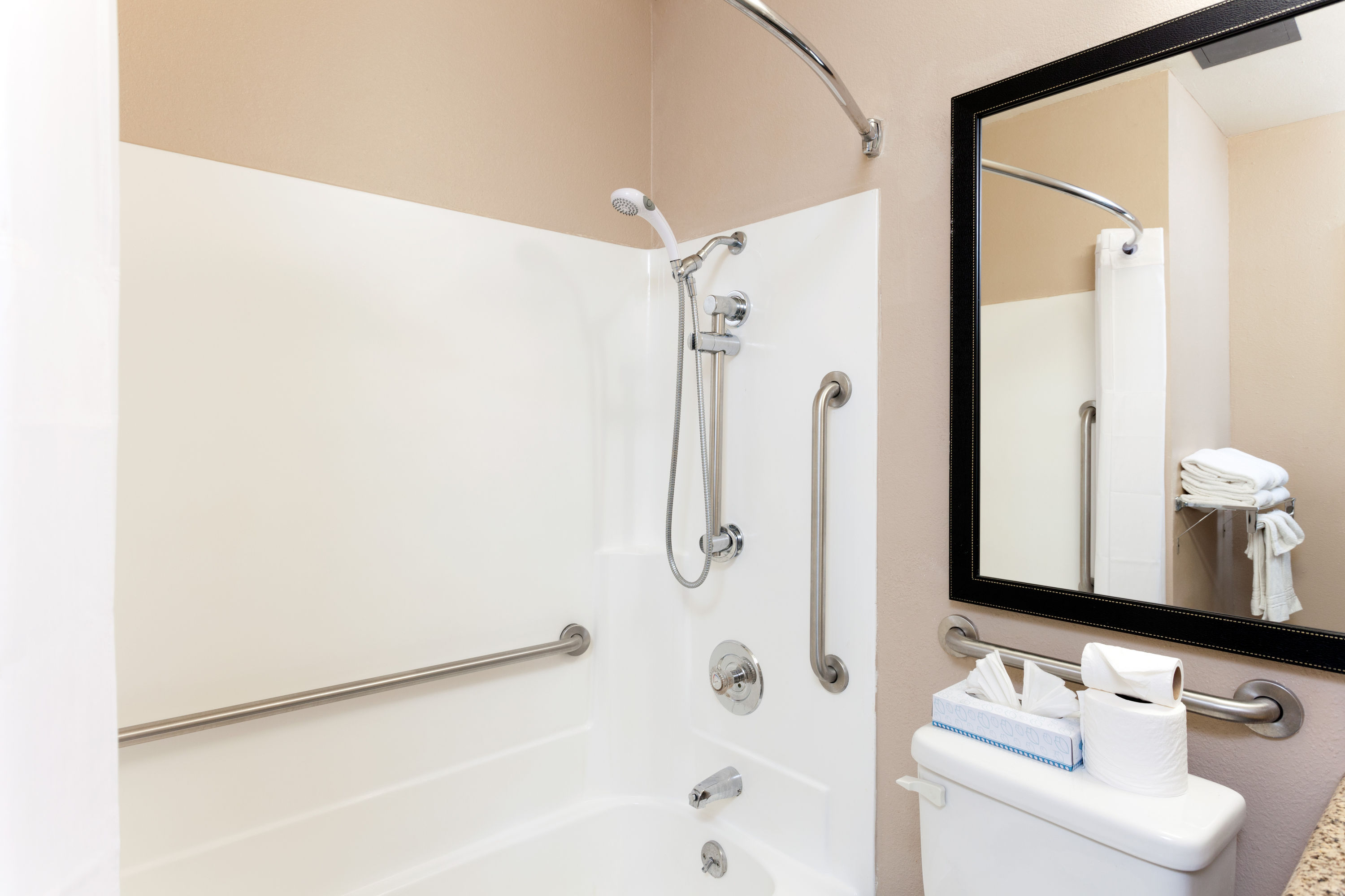 Guest room bath at the Days Inn by Wyndham Mission Valley/SDSU in San Diego, California