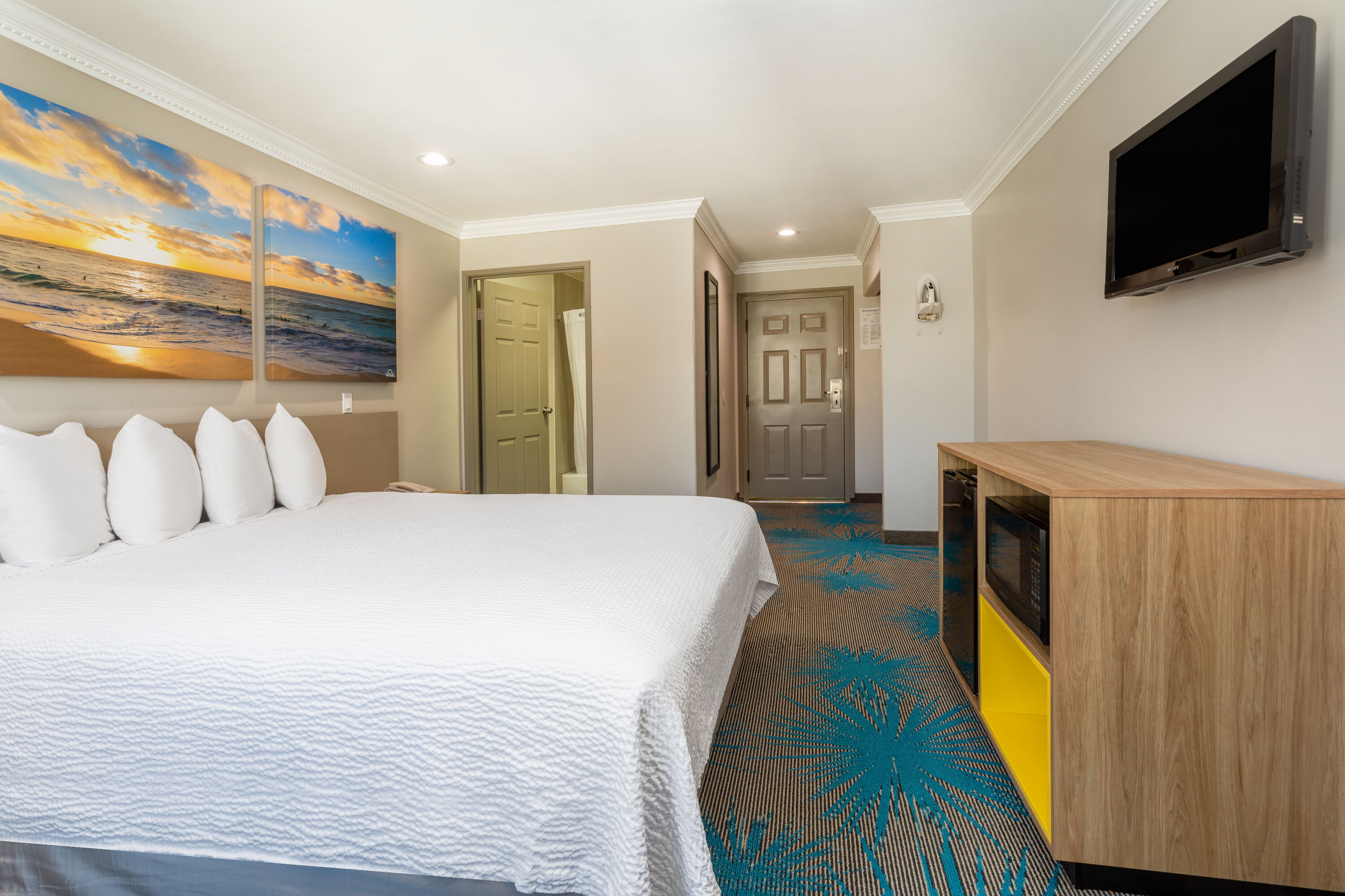 King bed guest room at the Days Inn by Wyndham Santa Monica in Santa Monica, California