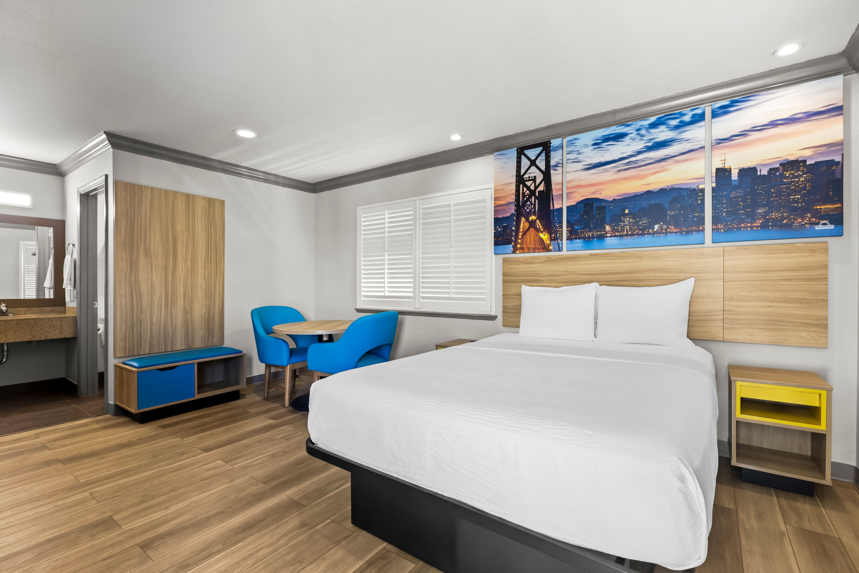 Queen bed guest room at the Days Inn by Wyndham San Francisco S/Oyster Point Airport in South San Francisco, California