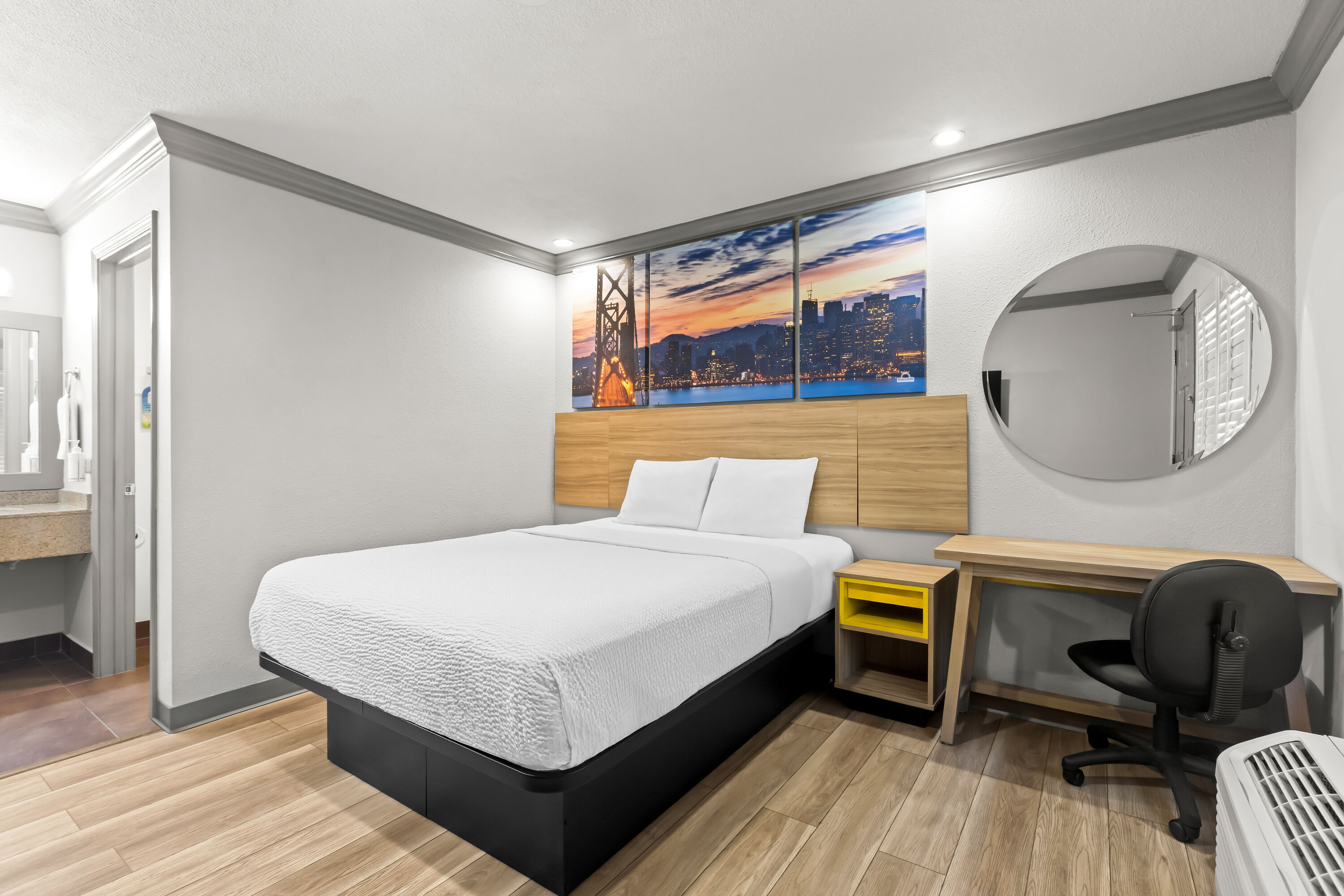 Queen bed guest room at the Days Inn by Wyndham San Francisco S/Oyster Point Airport in South San Francisco, California