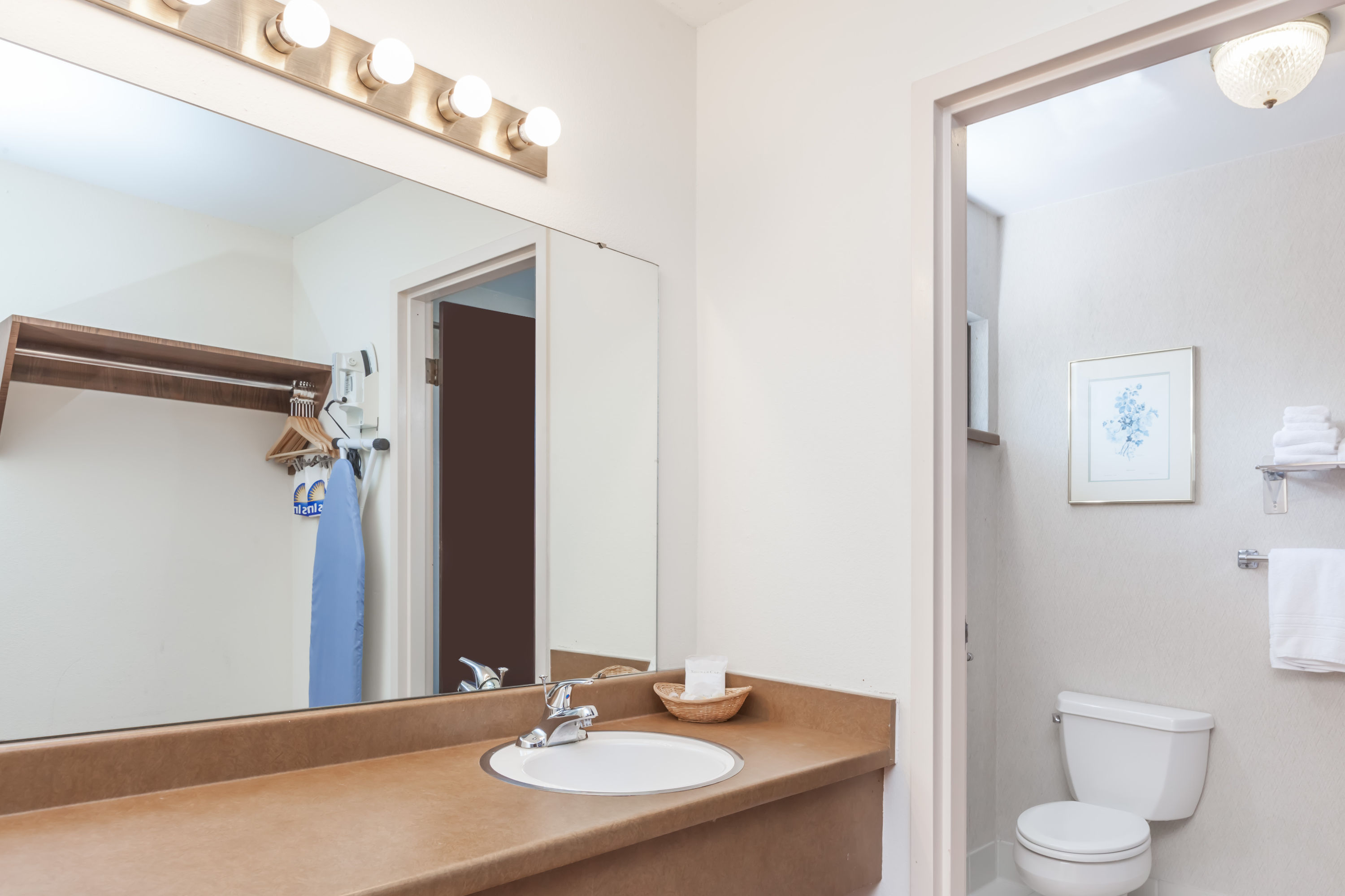 Guest room at the Days Inn & Suites by Wyndham Sunnyvale in Sunnyvale, California