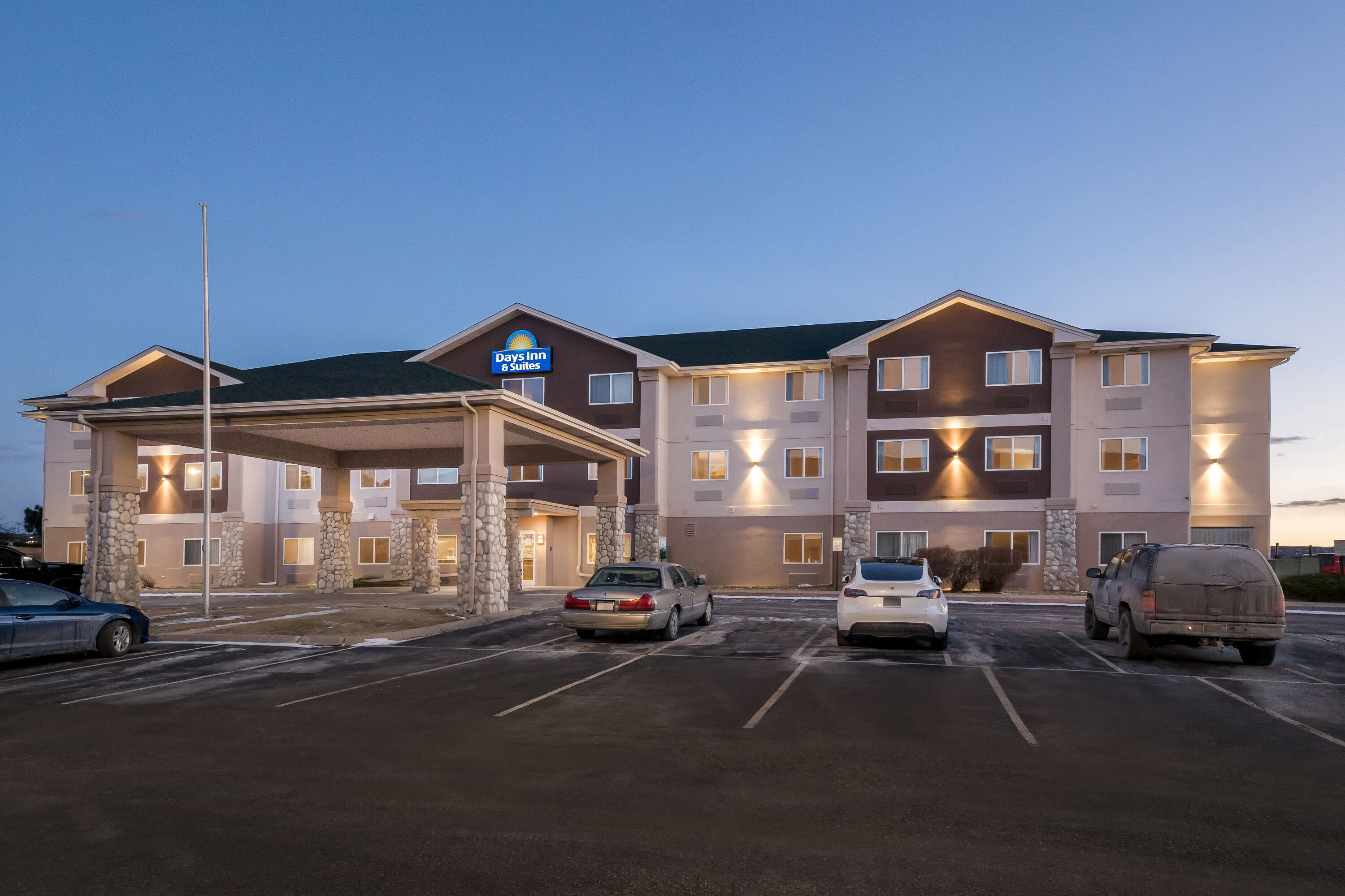 Exterior Night Image of Days Inn & Suites by Wyndham Castle Rock hotel in Castle Rock, Colorado