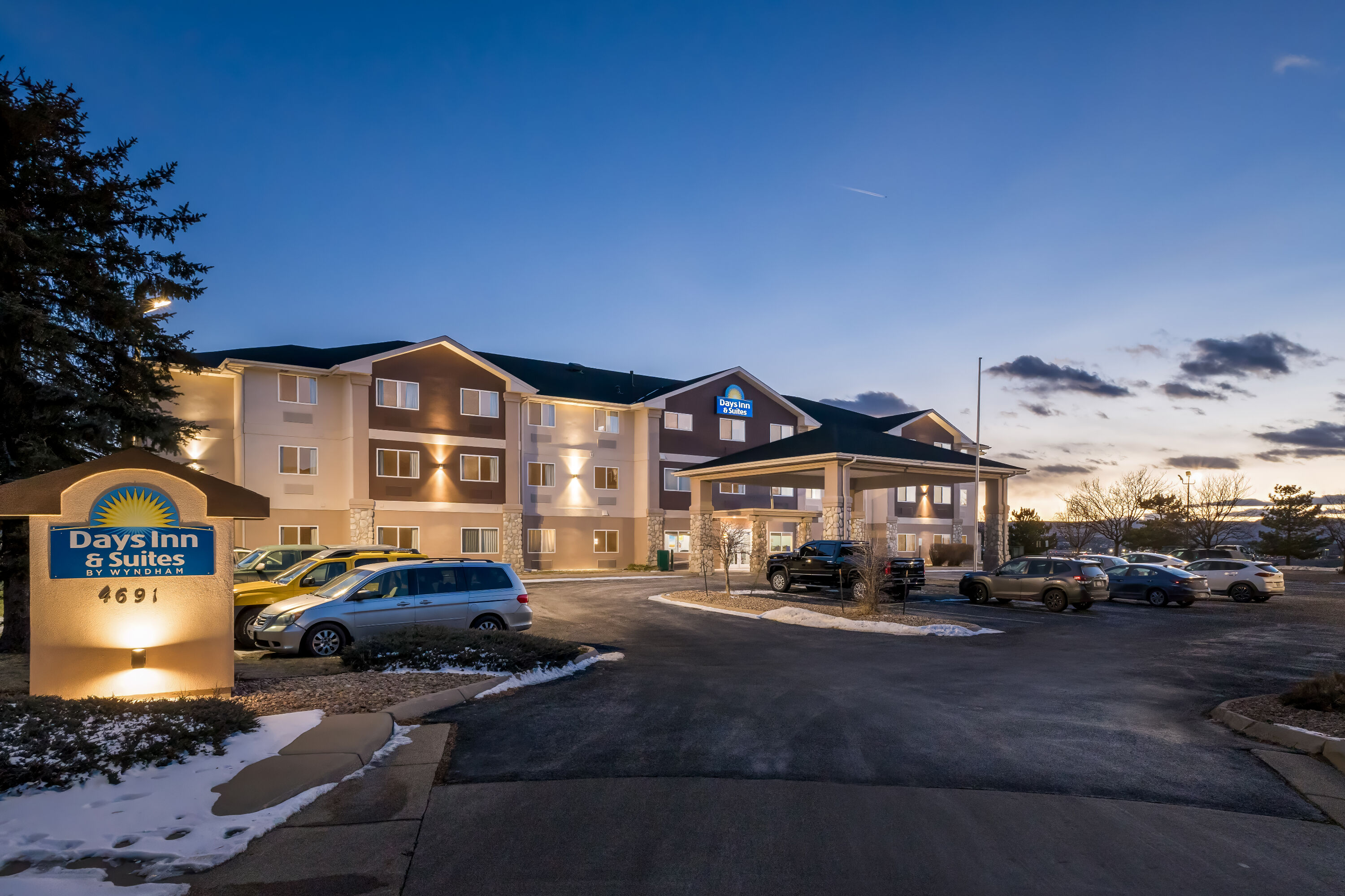 Exterior Night Image of Days Inn & Suites by Wyndham Castle Rock hotel in Castle Rock, Colorado