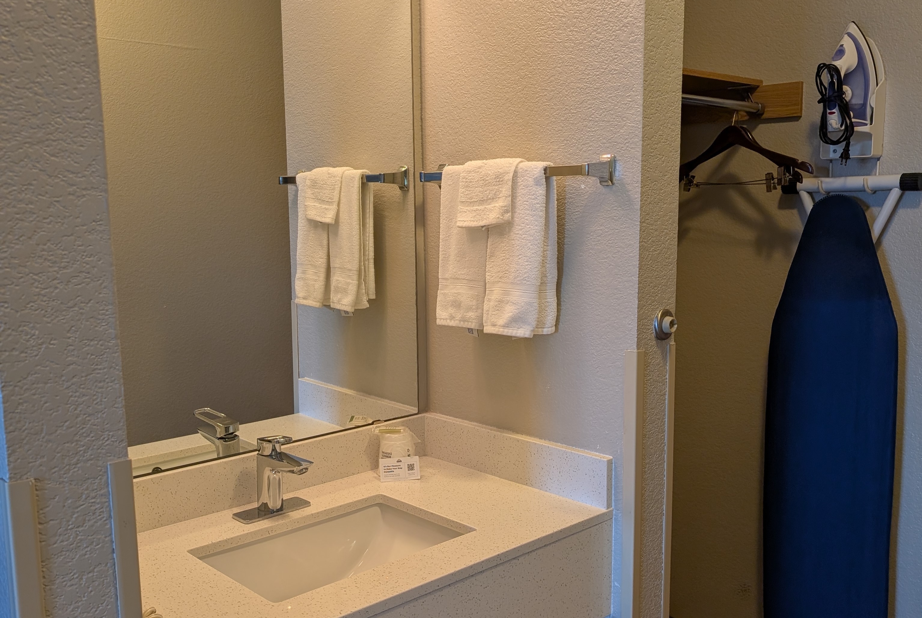 Guest room bath at the Days Inn & Suites by Wyndham Castle Rock in Castle Rock, Colorado