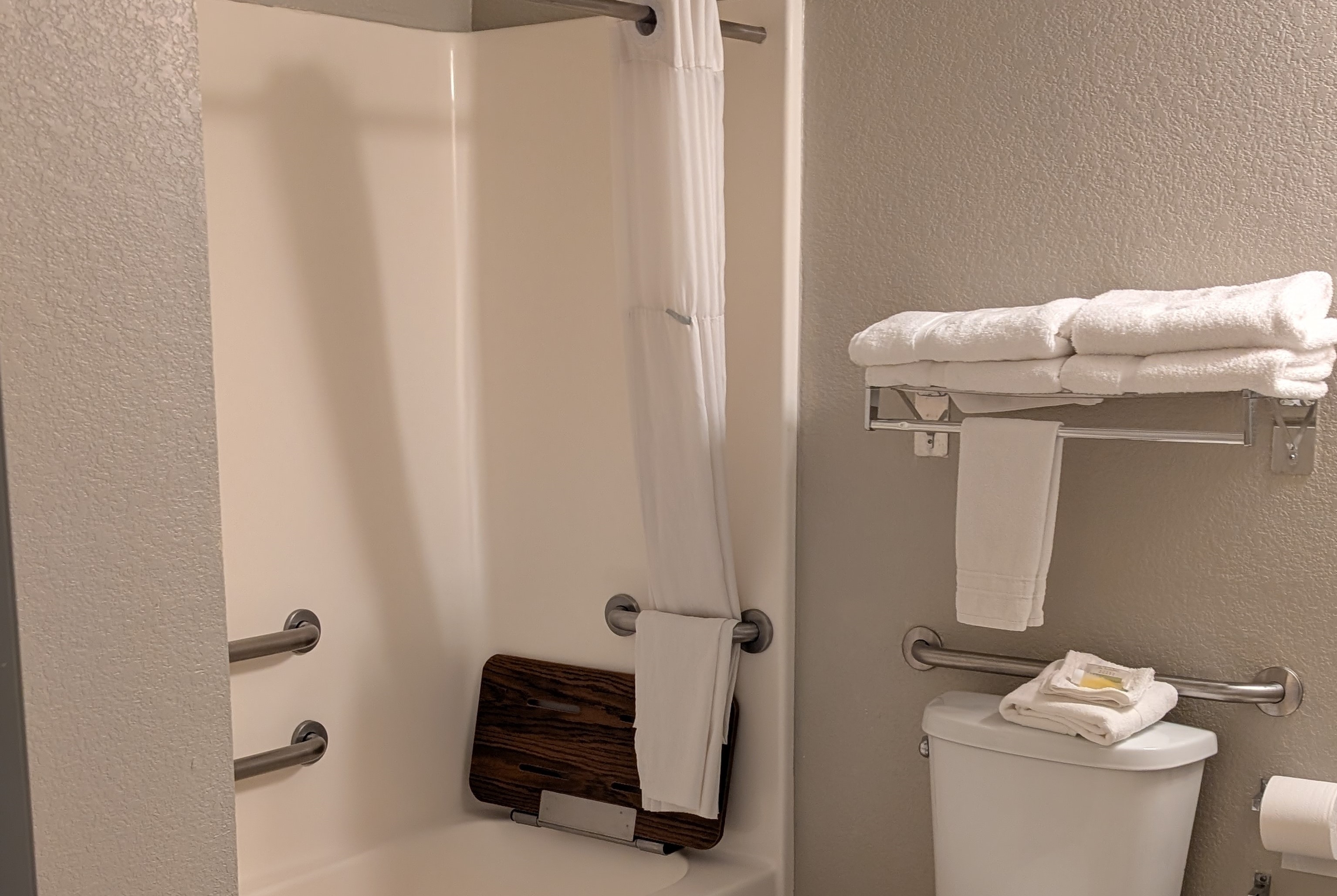Guest room bath at the Days Inn & Suites by Wyndham Castle Rock in Castle Rock, Colorado