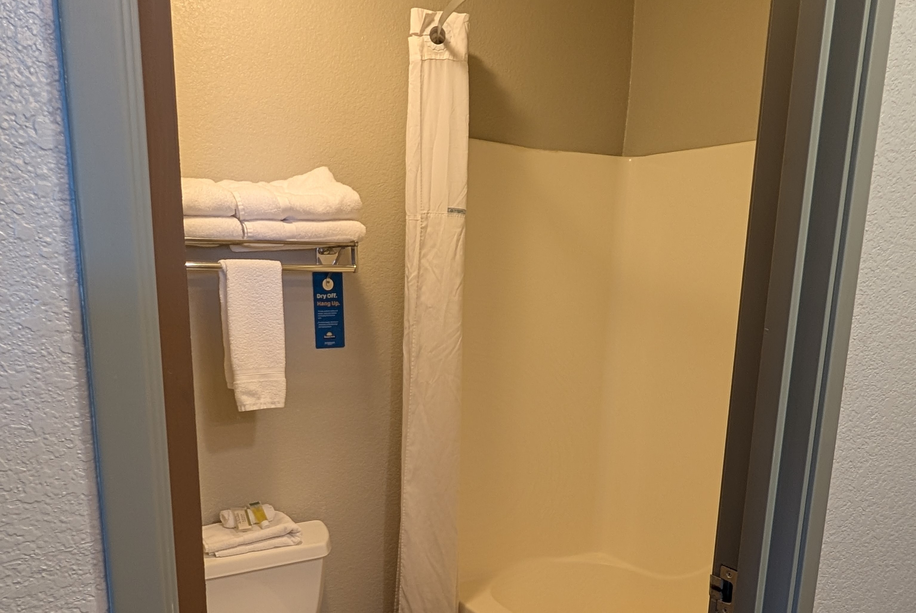 Guest room bath at the Days Inn & Suites by Wyndham Castle Rock in Castle Rock, Colorado
