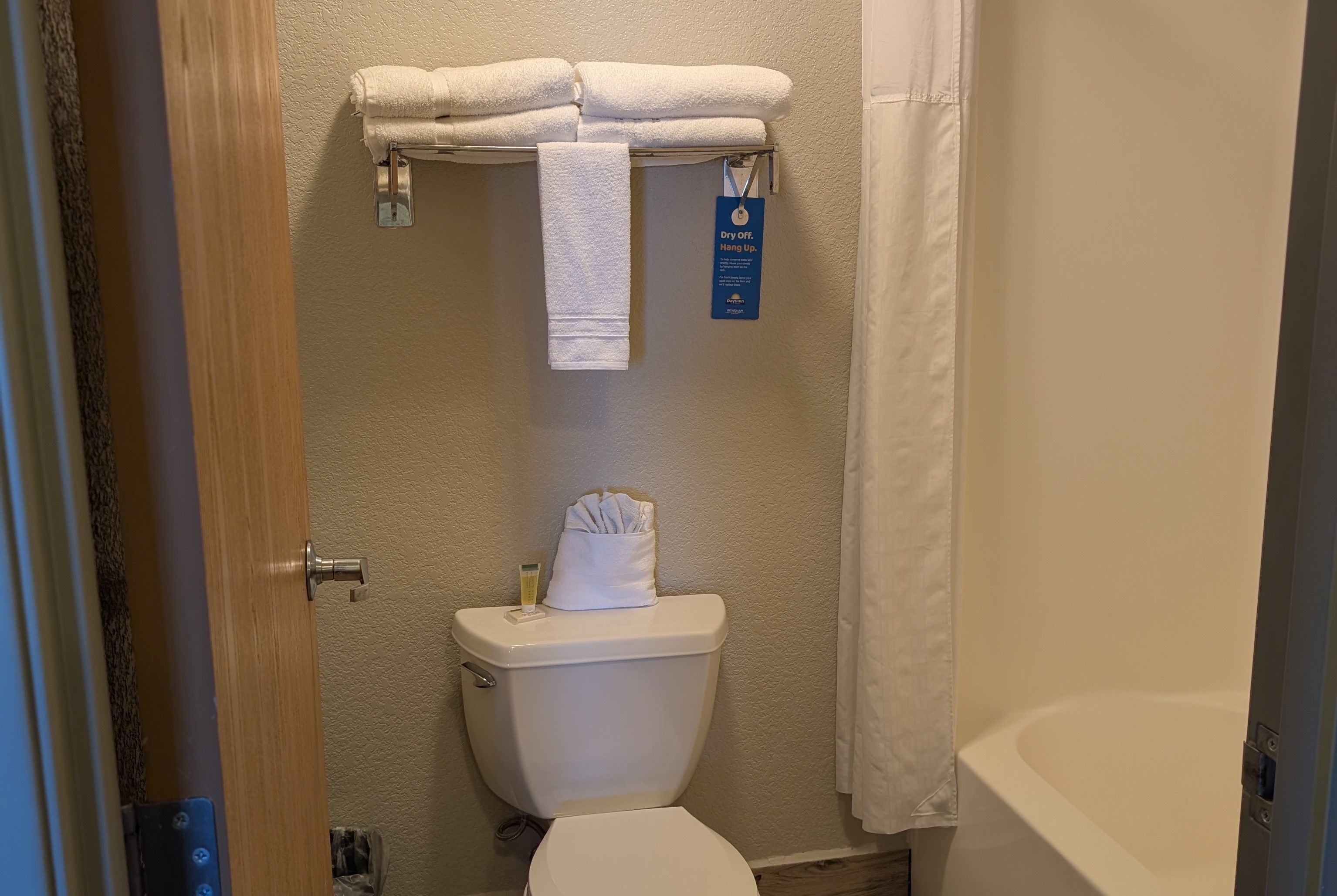 Guest room bath at the Days Inn & Suites by Wyndham Castle Rock in Castle Rock, Colorado