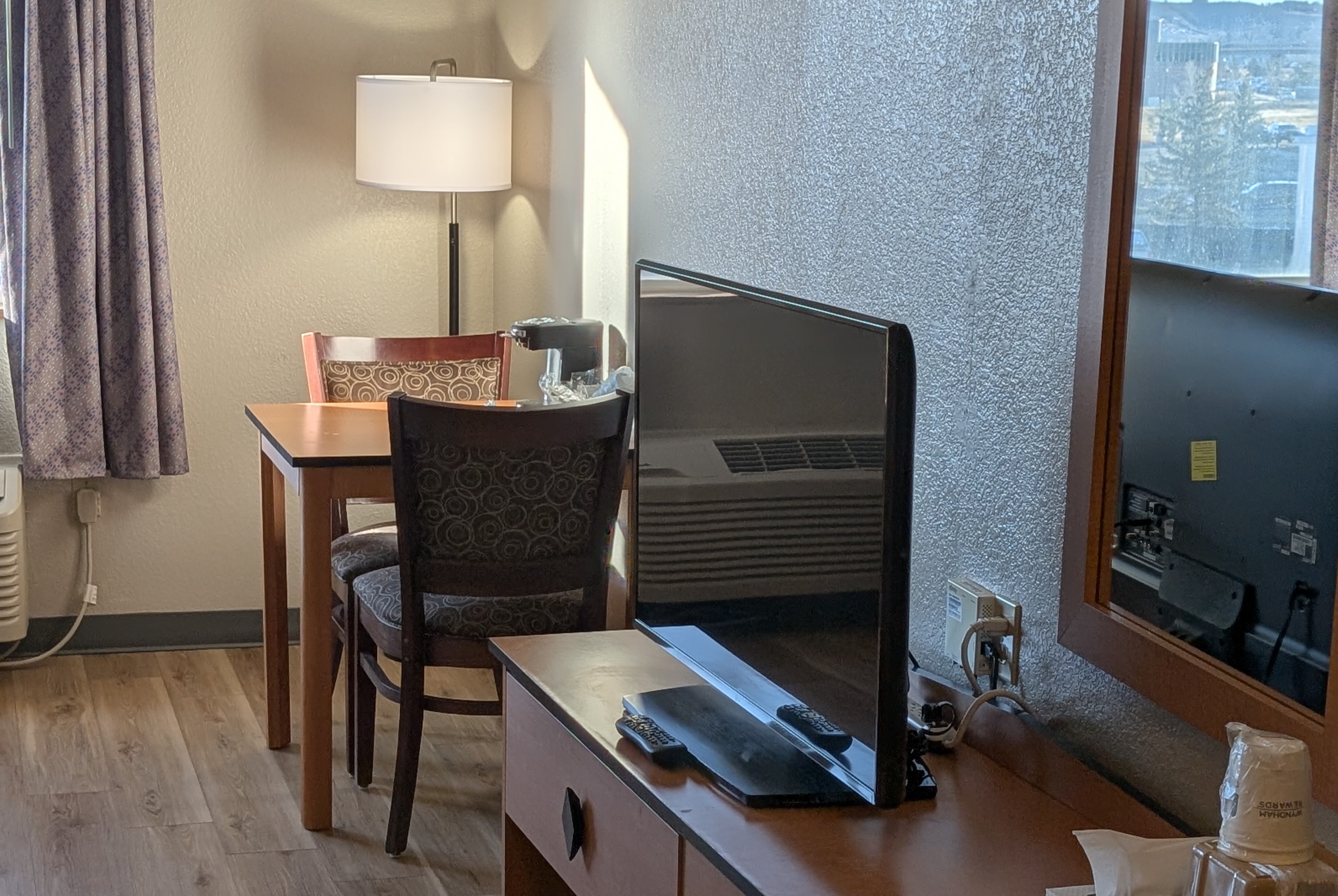 Guest room at the Days Inn & Suites by Wyndham Castle Rock in Castle Rock, Colorado