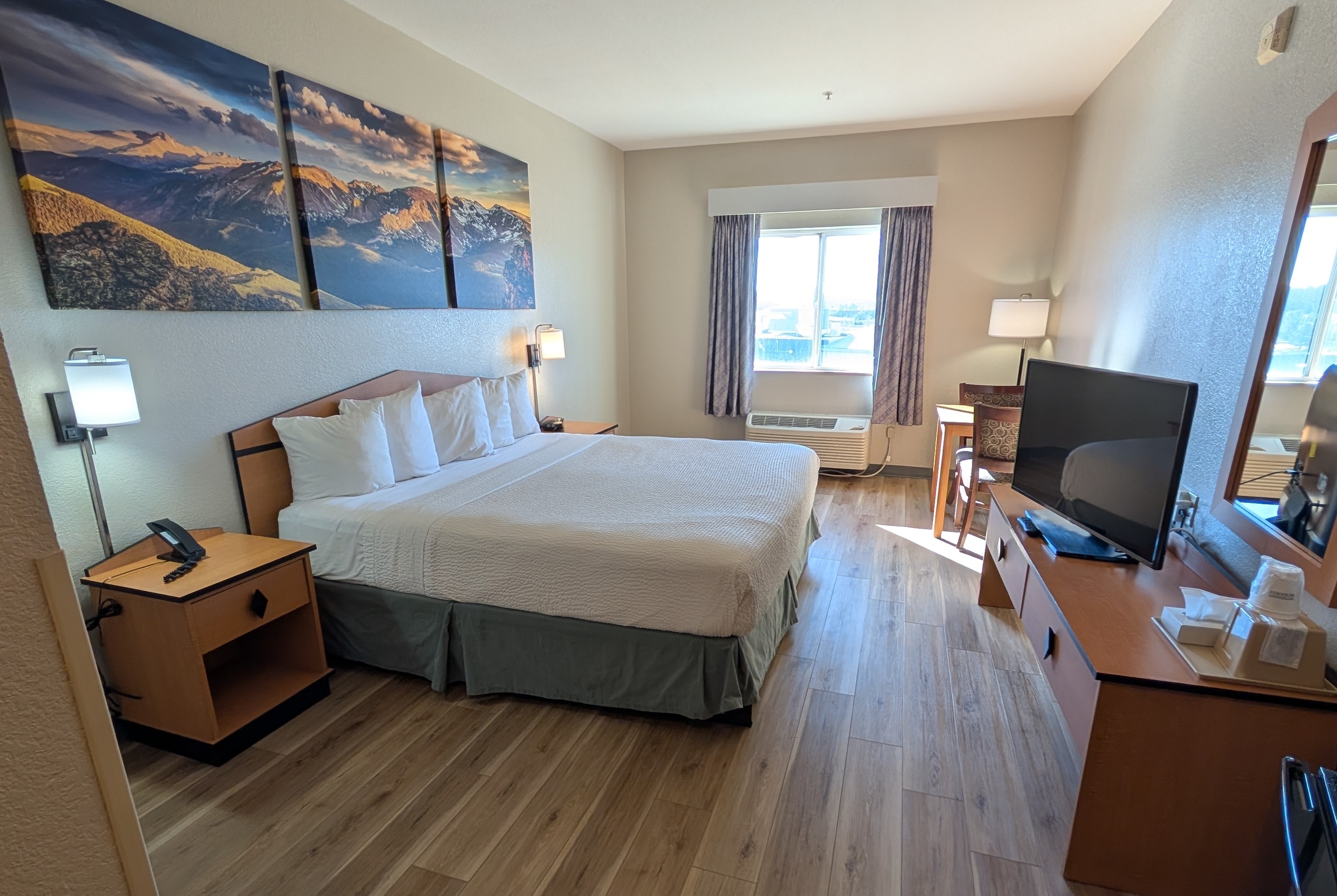 Guest room at the Days Inn & Suites by Wyndham Castle Rock in Castle Rock, Colorado