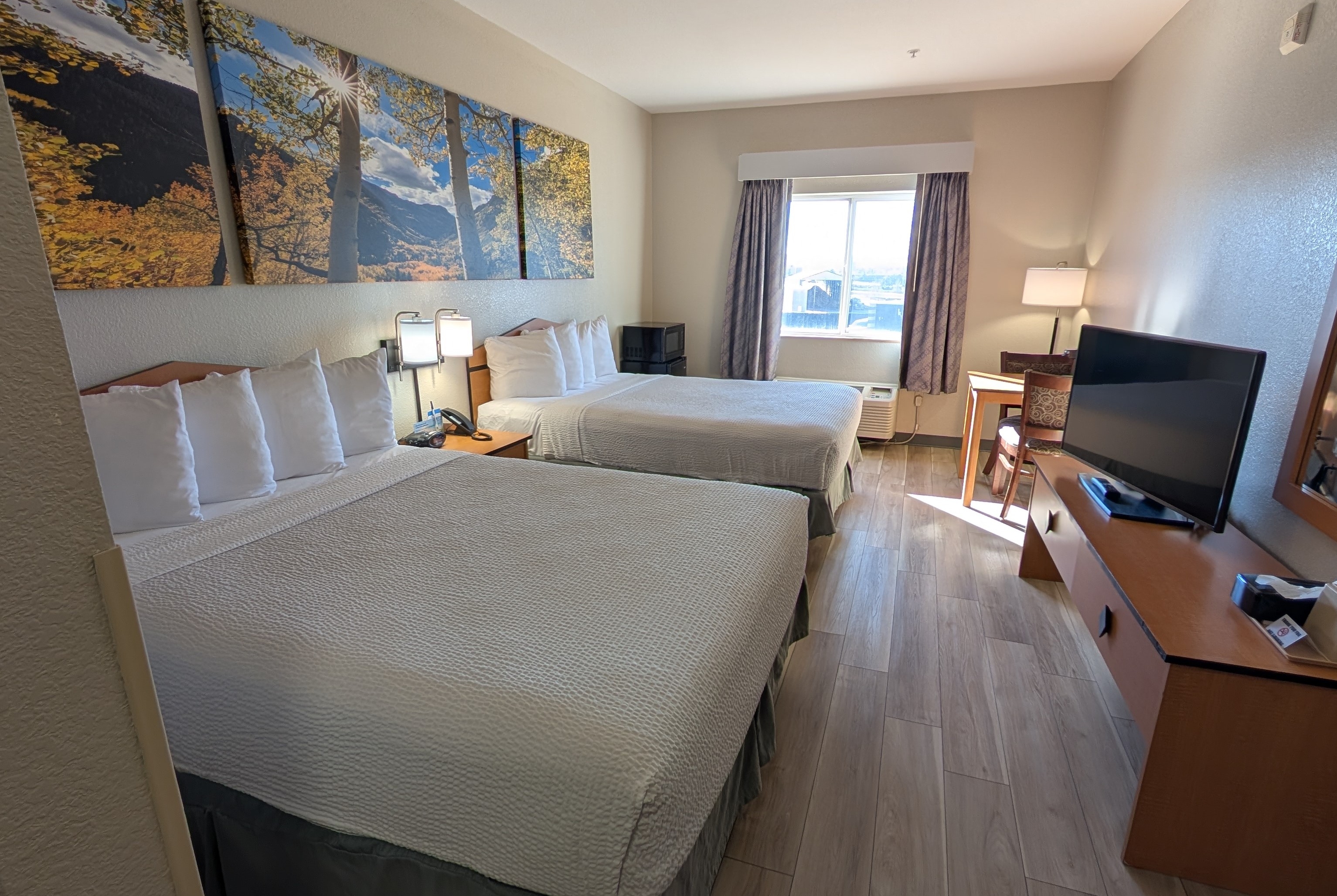 Guest room at the Days Inn & Suites by Wyndham Castle Rock in Castle Rock, Colorado