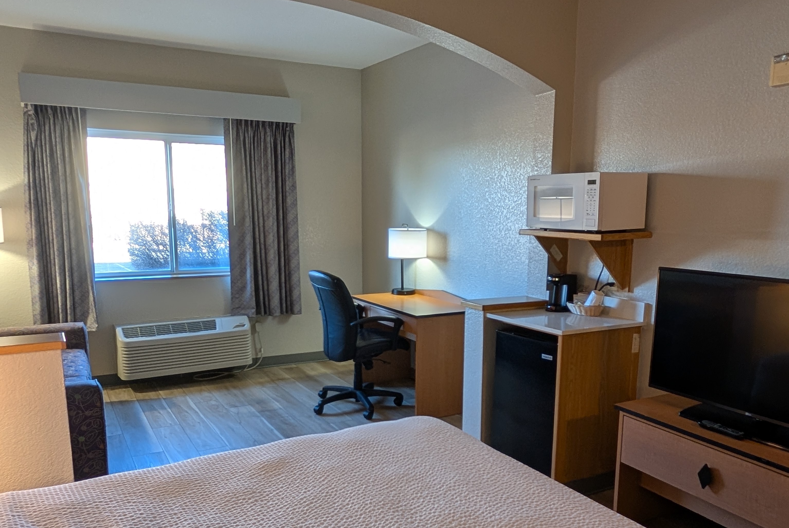 Guest room at the Days Inn & Suites by Wyndham Castle Rock in Castle Rock, Colorado