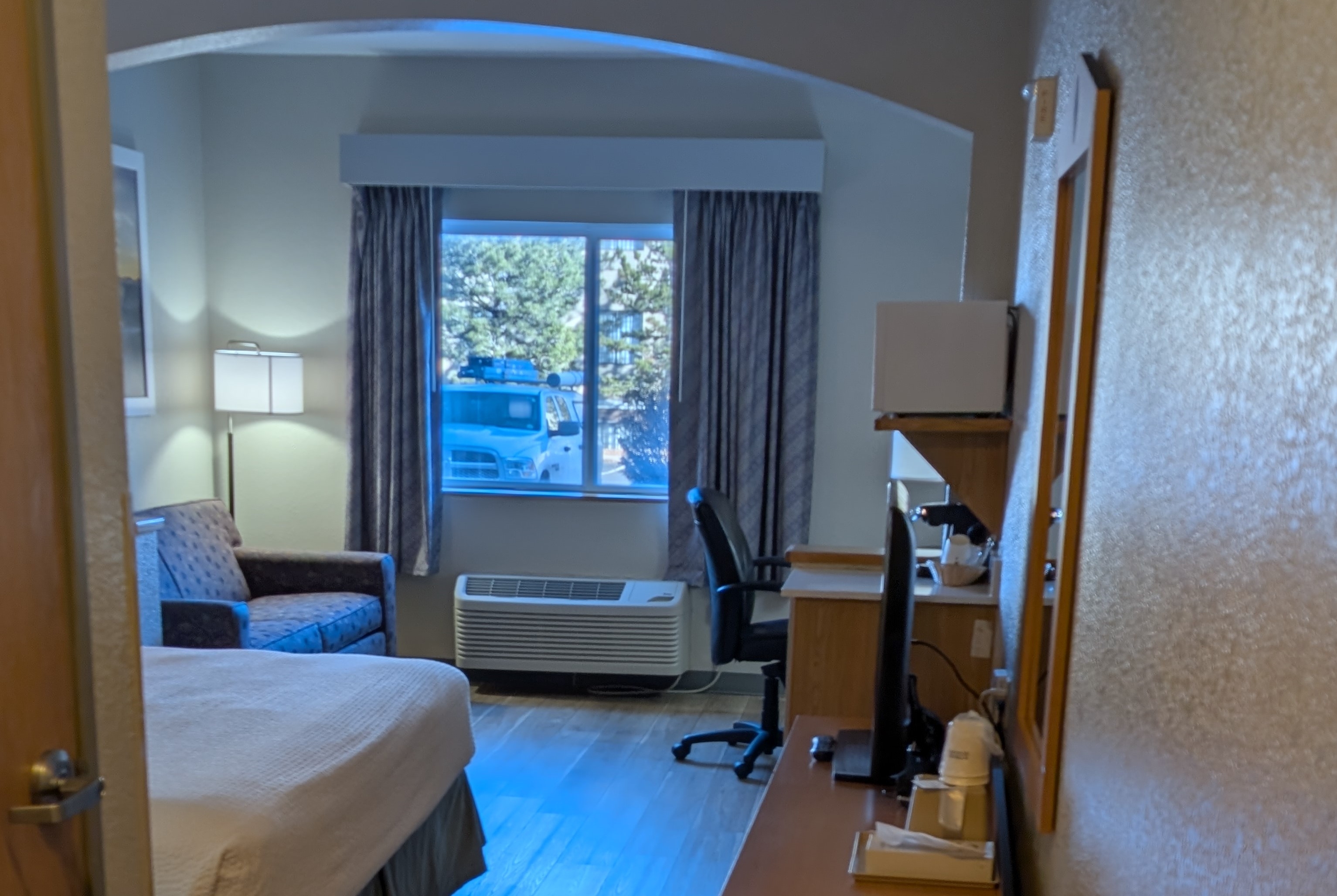 Guest room at the Days Inn & Suites by Wyndham Castle Rock in Castle Rock, Colorado