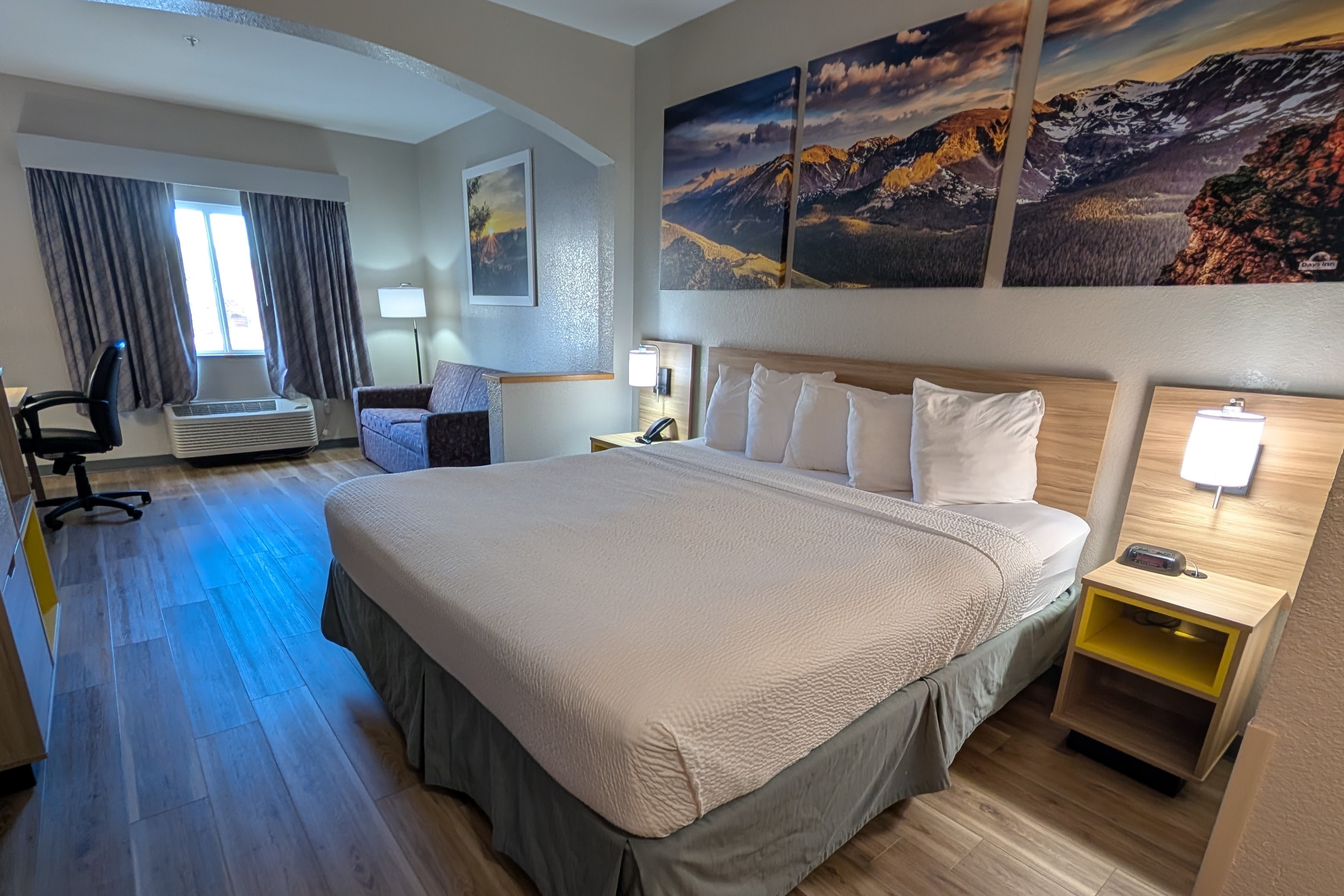 Guest room at the Days Inn & Suites by Wyndham Castle Rock in Castle Rock, Colorado