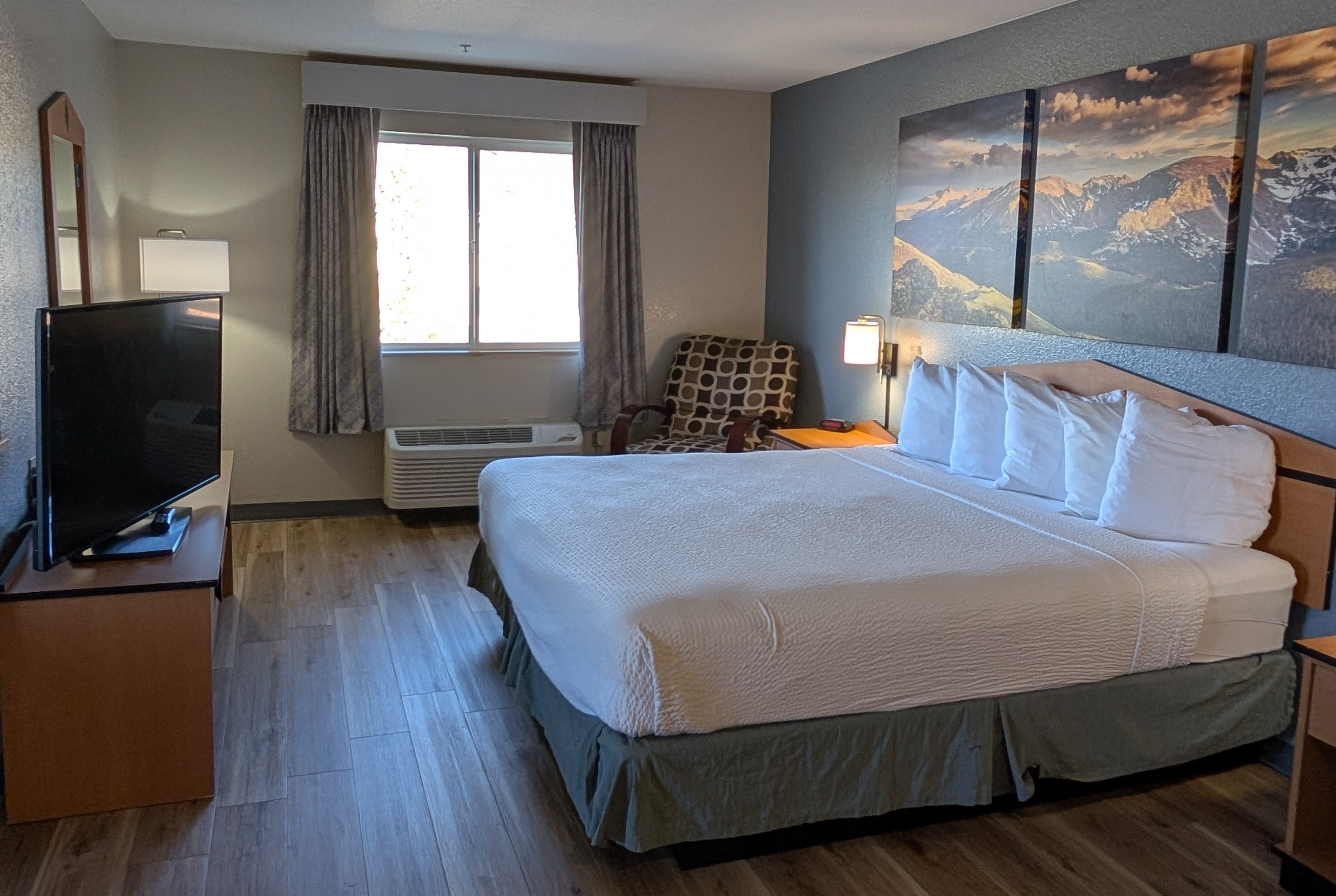 Guest room at the Days Inn & Suites by Wyndham Castle Rock in Castle Rock, Colorado