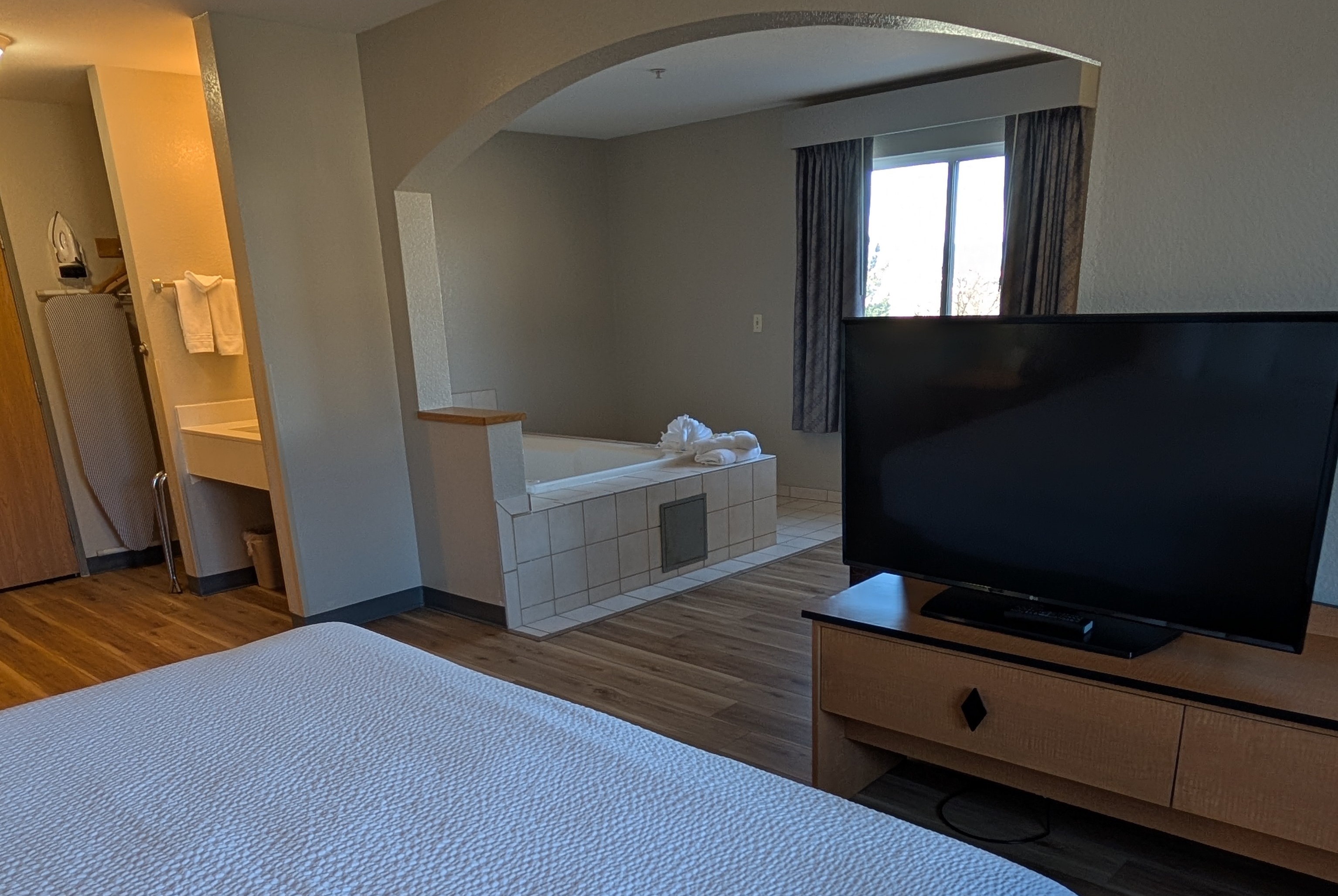 Guest room at the Days Inn & Suites by Wyndham Castle Rock in Castle Rock, Colorado