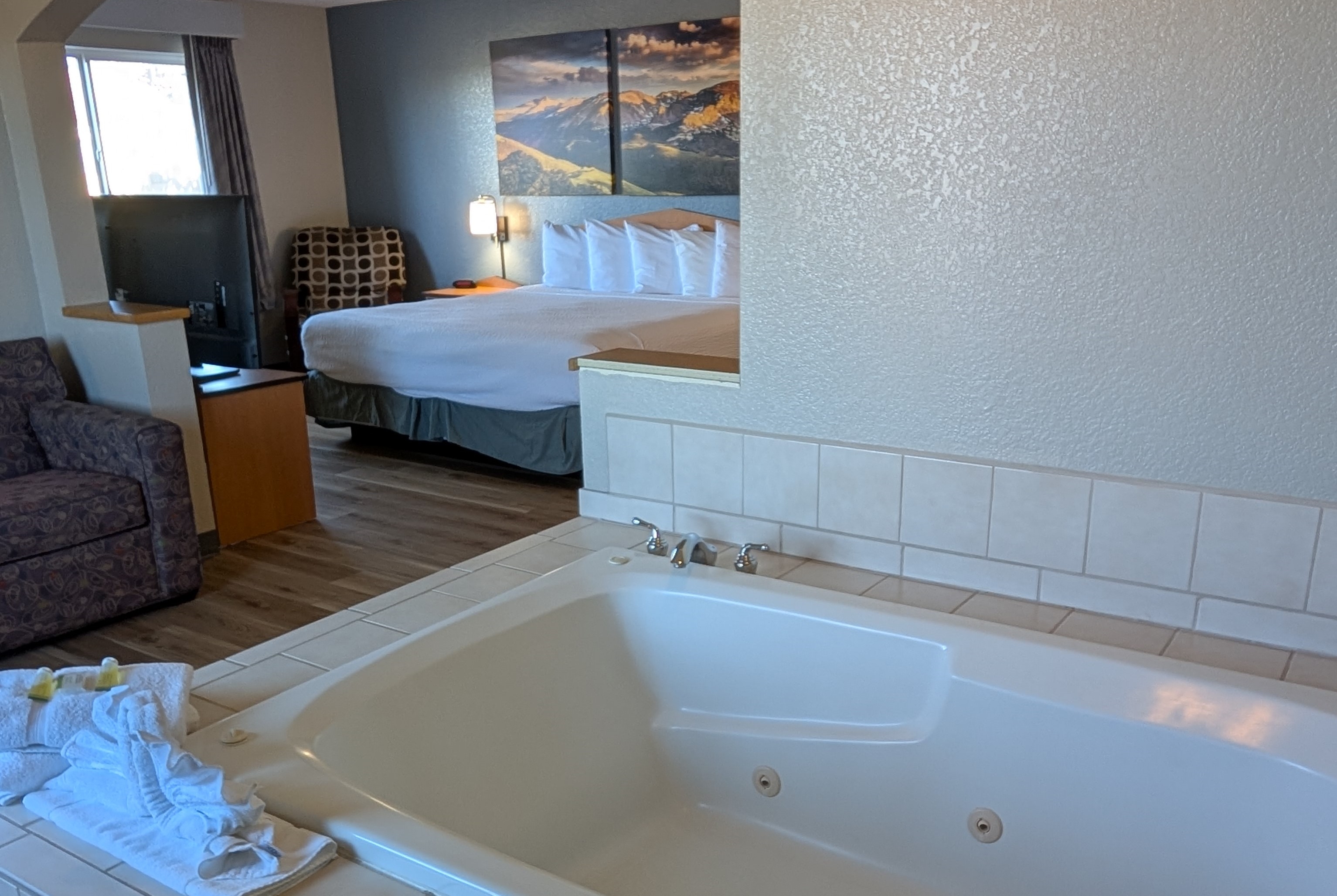 Guest room at the Days Inn & Suites by Wyndham Castle Rock in Castle Rock, Colorado