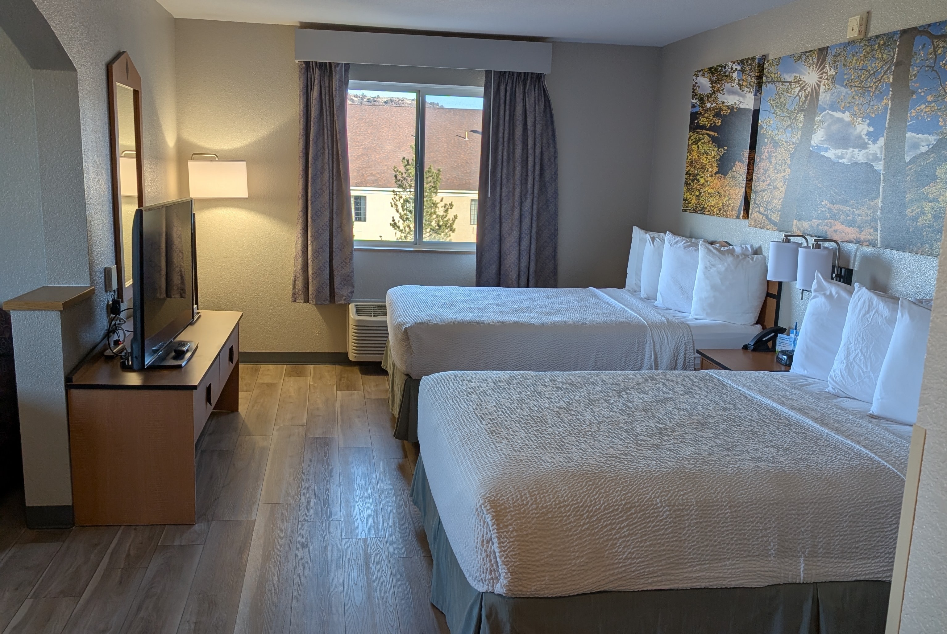 Guest room at the Days Inn & Suites by Wyndham Castle Rock in Castle Rock, Colorado