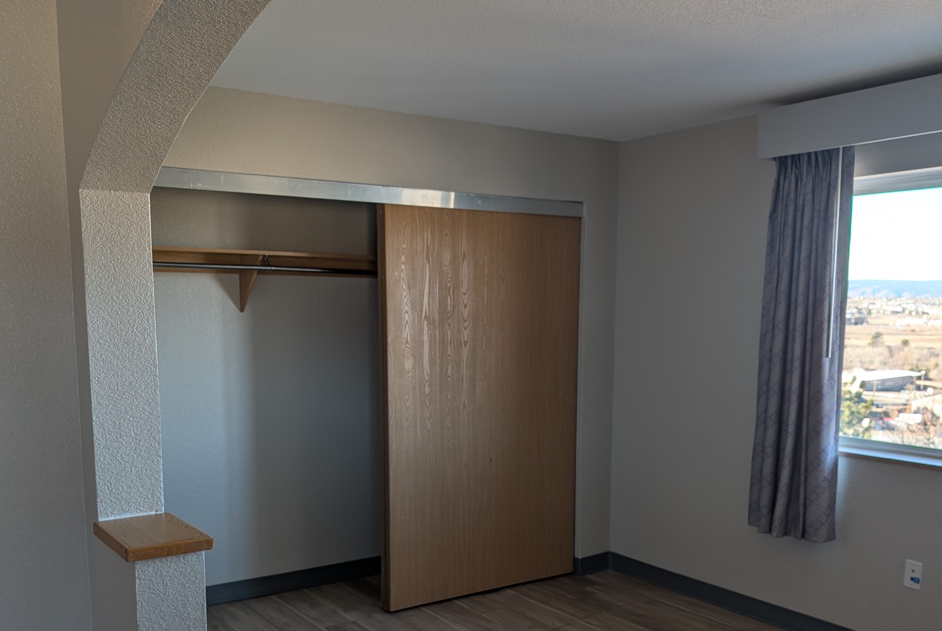 Guest room at the Days Inn & Suites by Wyndham Castle Rock in Castle Rock, Colorado