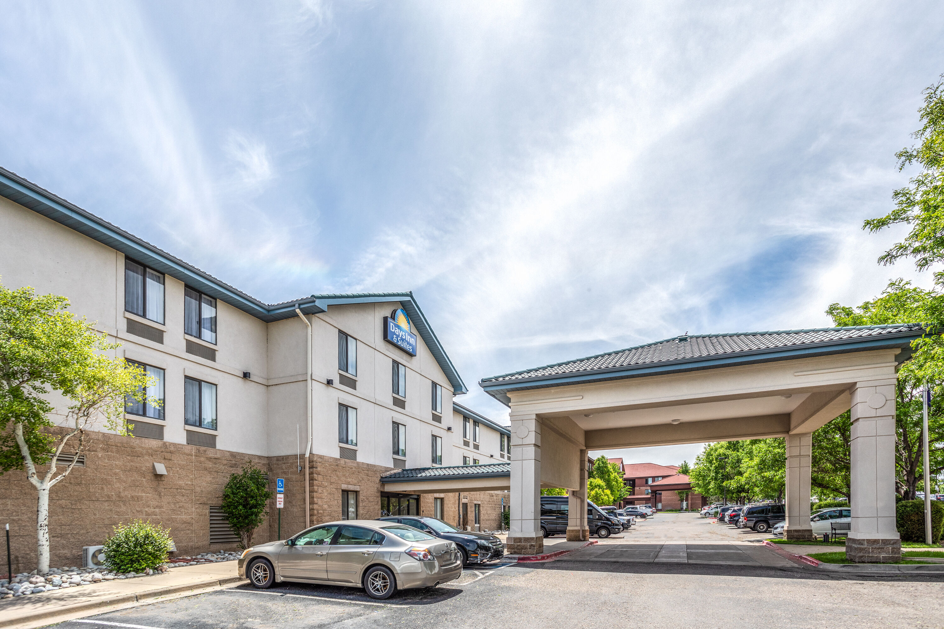 Exterior Day Image of Days Inn & Suites by Wyndham Denver International Airport hotel in Denver, Colorado
