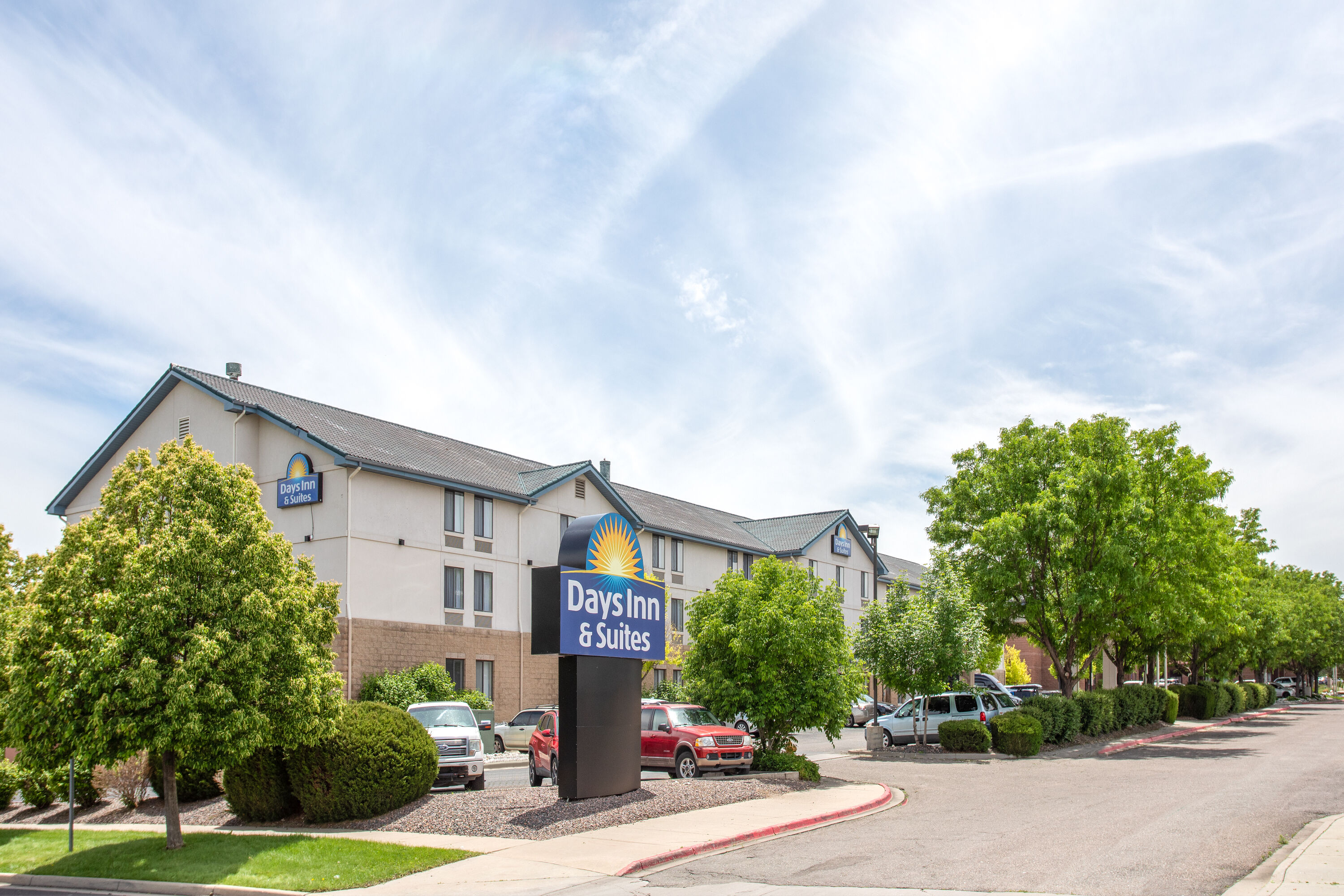 Exterior Day Image of Days Inn & Suites by Wyndham Denver International Airport hotel in Denver, Colorado