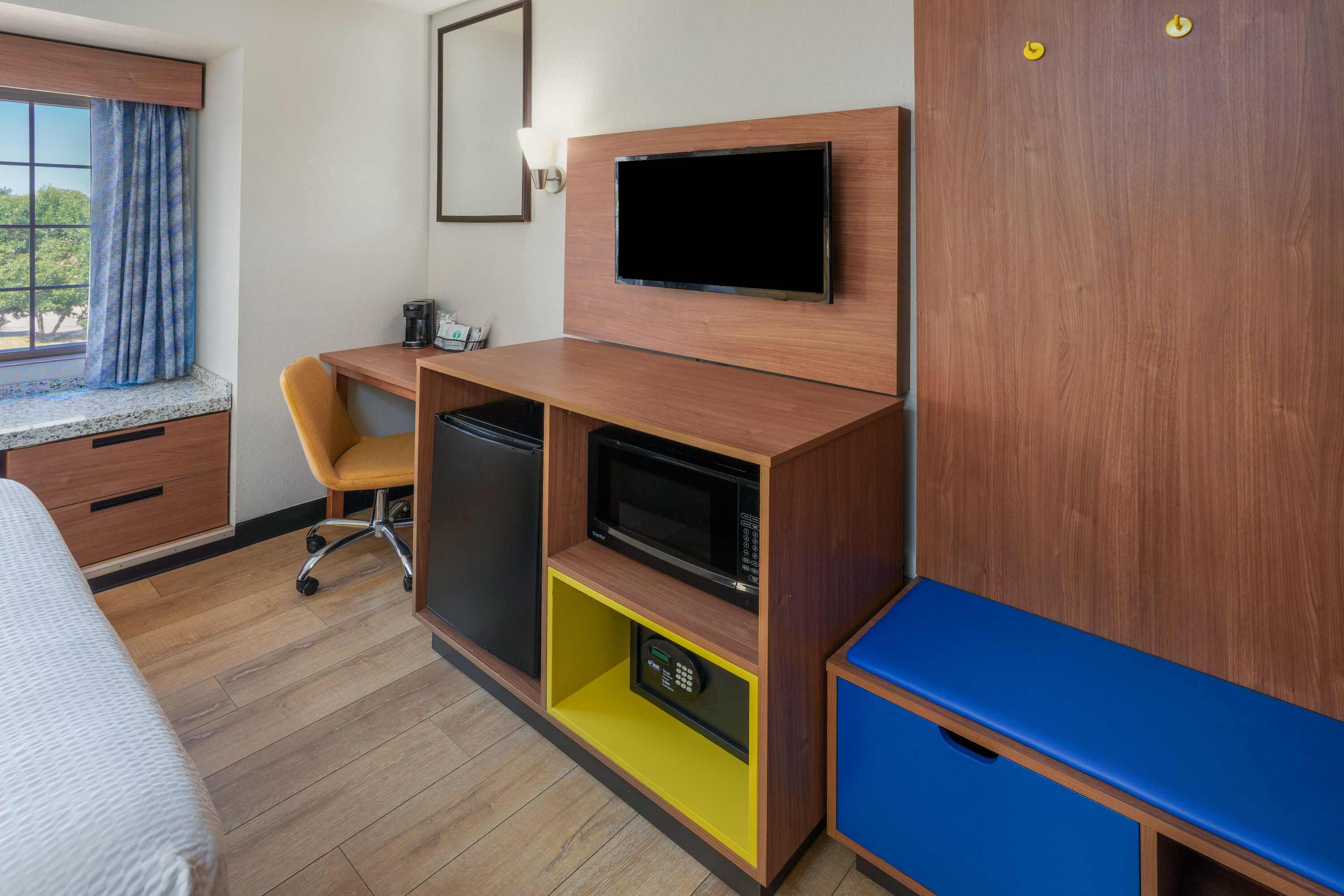Guest room at the Days Inn & Suites by Wyndham Greeley in Greeley, Colorado