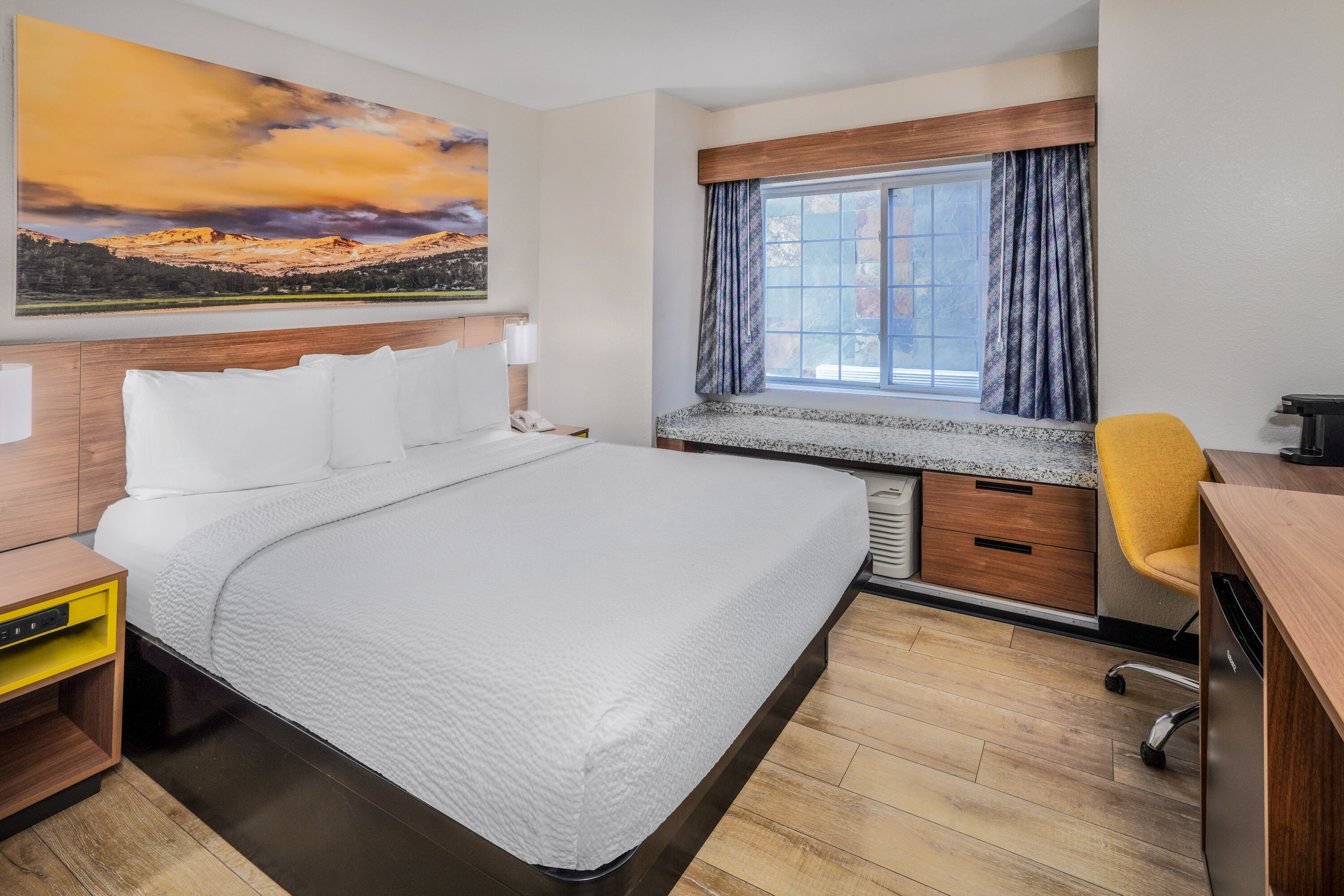 Guest room at the Days Inn & Suites by Wyndham Greeley in Greeley, Colorado