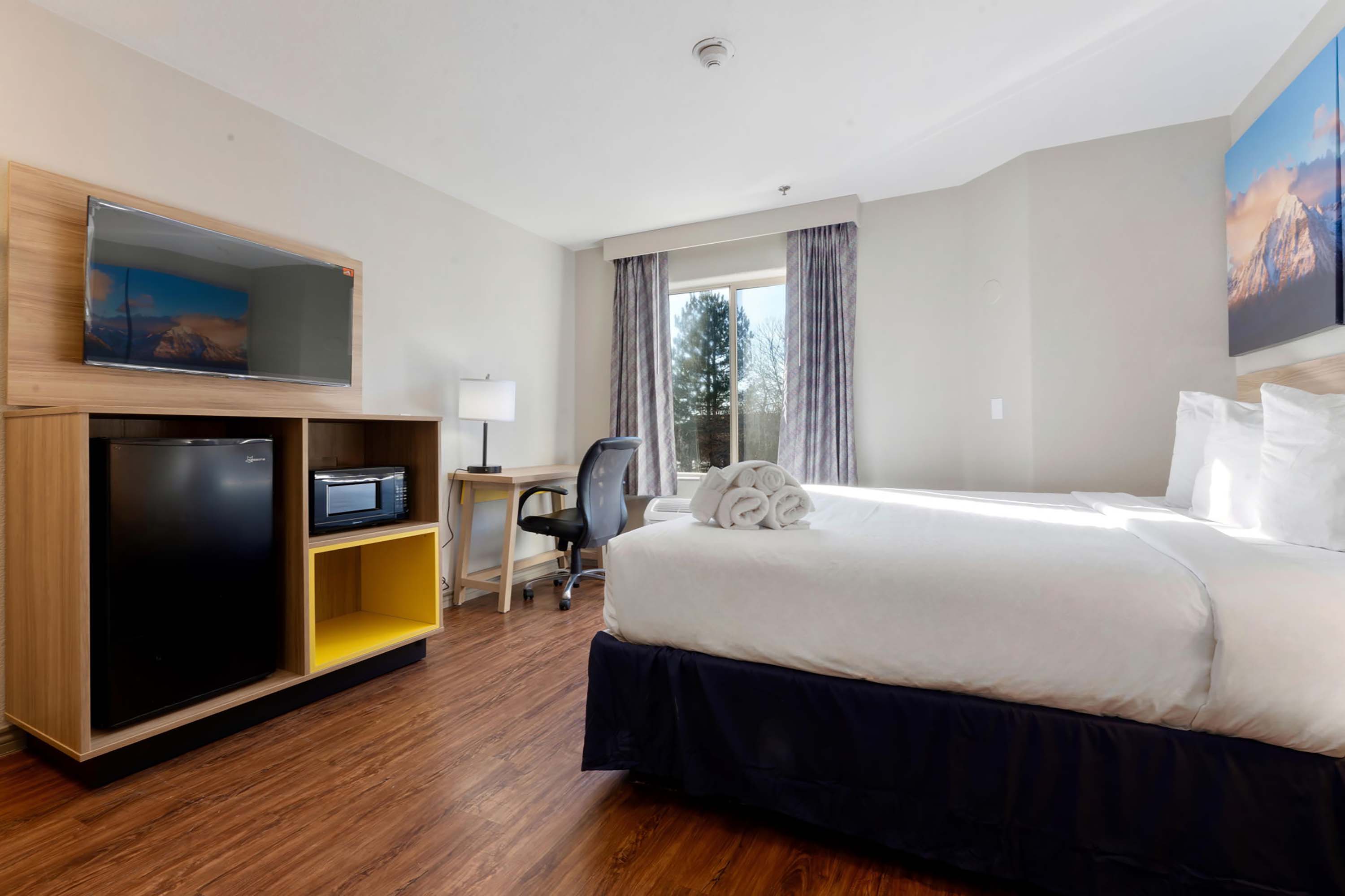 Guest room at the Days Inn by Wyndham Thornton in Thornton, Colorado