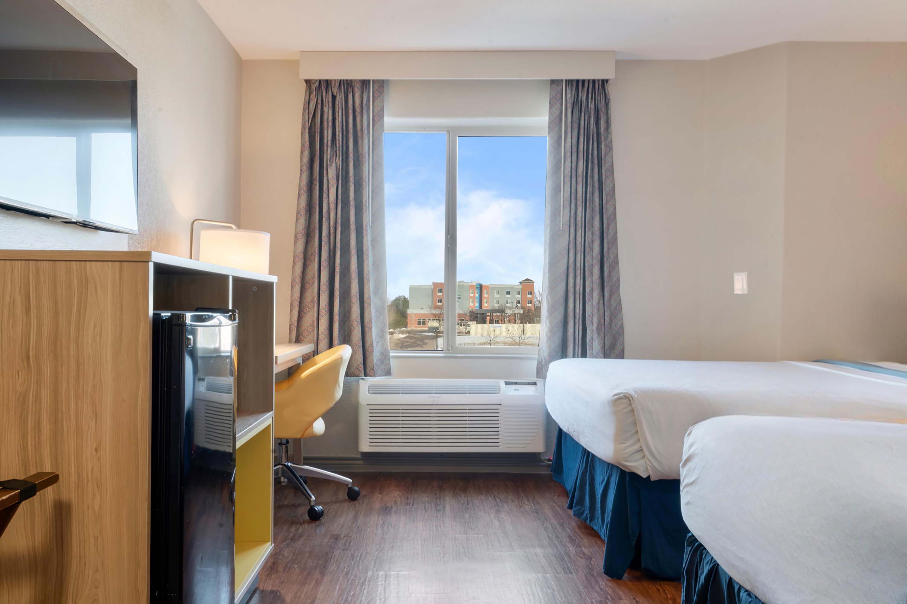 Guest room at the Days Inn by Wyndham Thornton in Thornton, Colorado