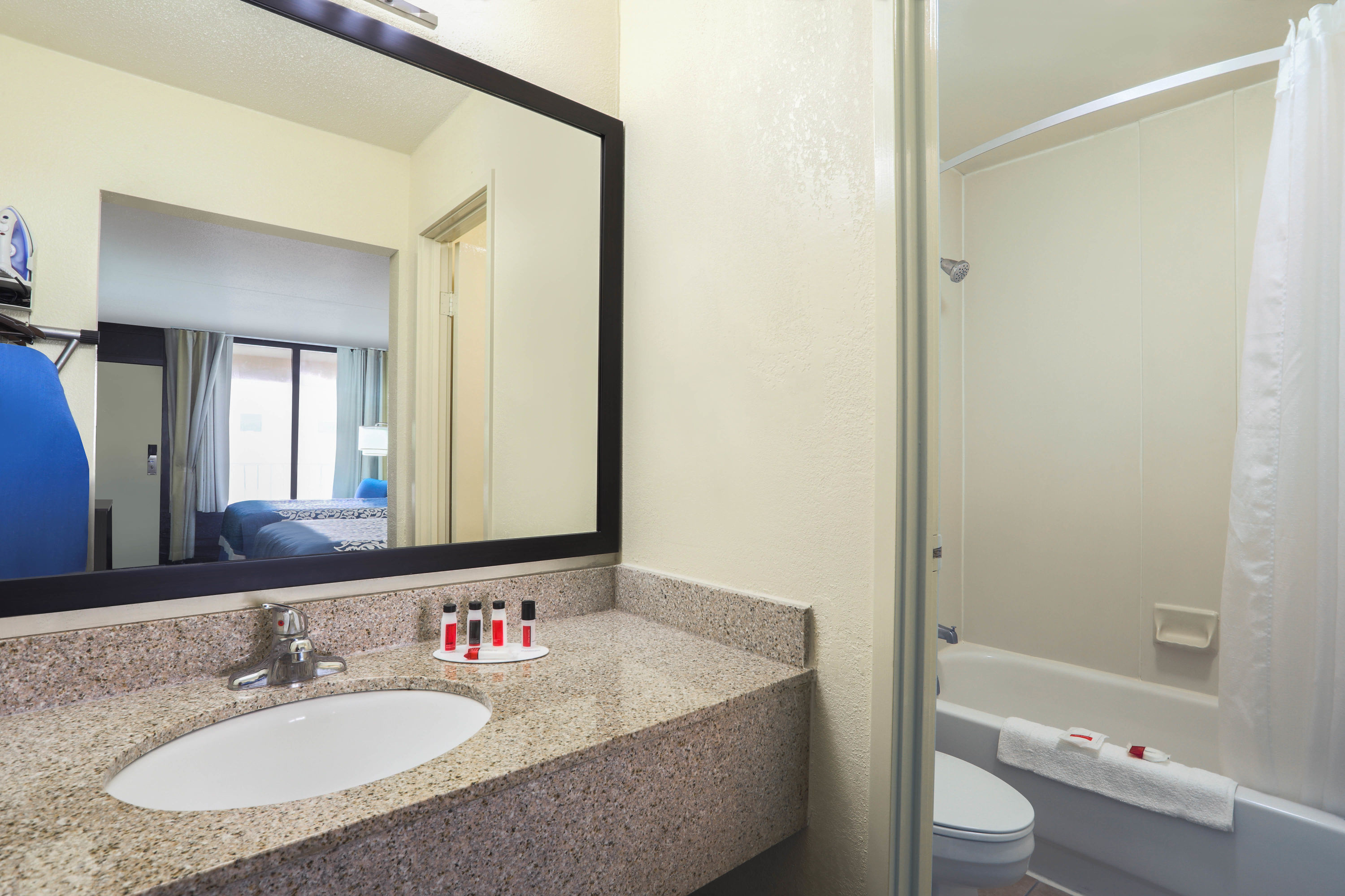 Guest room bath at the Days Inn by Wyndham Newark Wilmington in Newark, Delaware