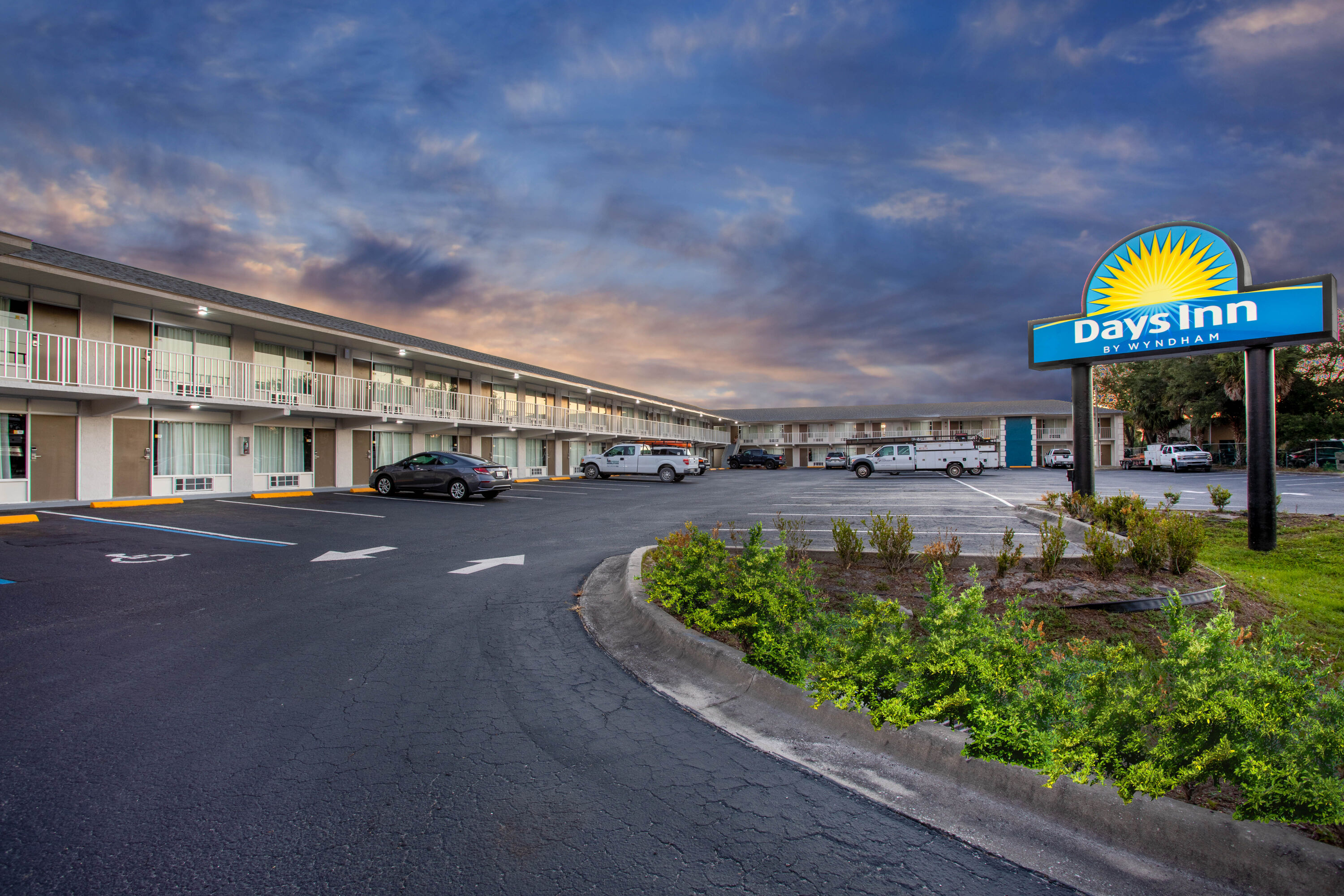 Exterior Dusk Image of Days Inn by Wyndham Apopka/Orlando hotel in APOPKA, Florida
