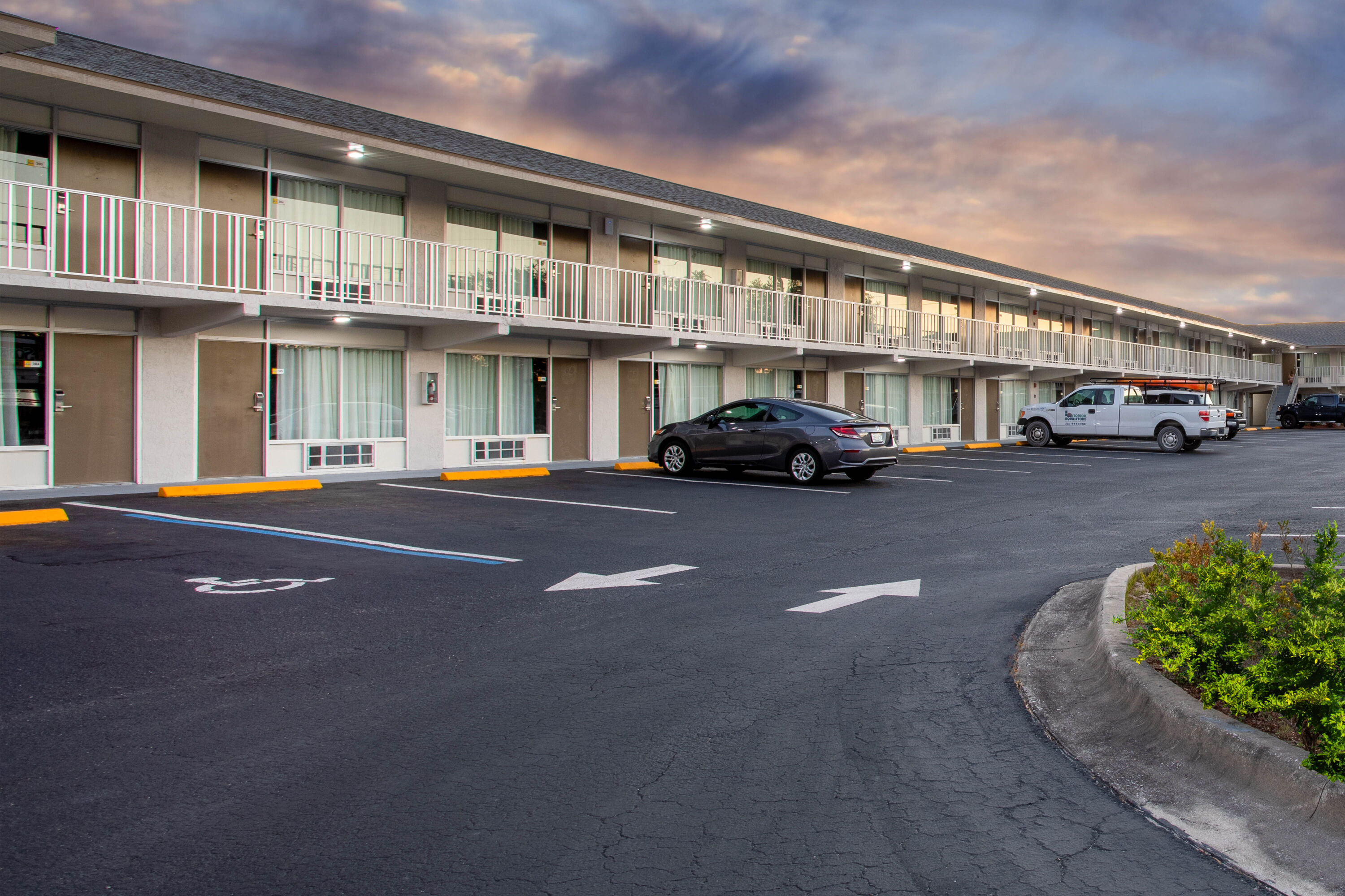 Exterior Dusk Image of Days Inn by Wyndham Apopka/Orlando hotel in APOPKA, Florida