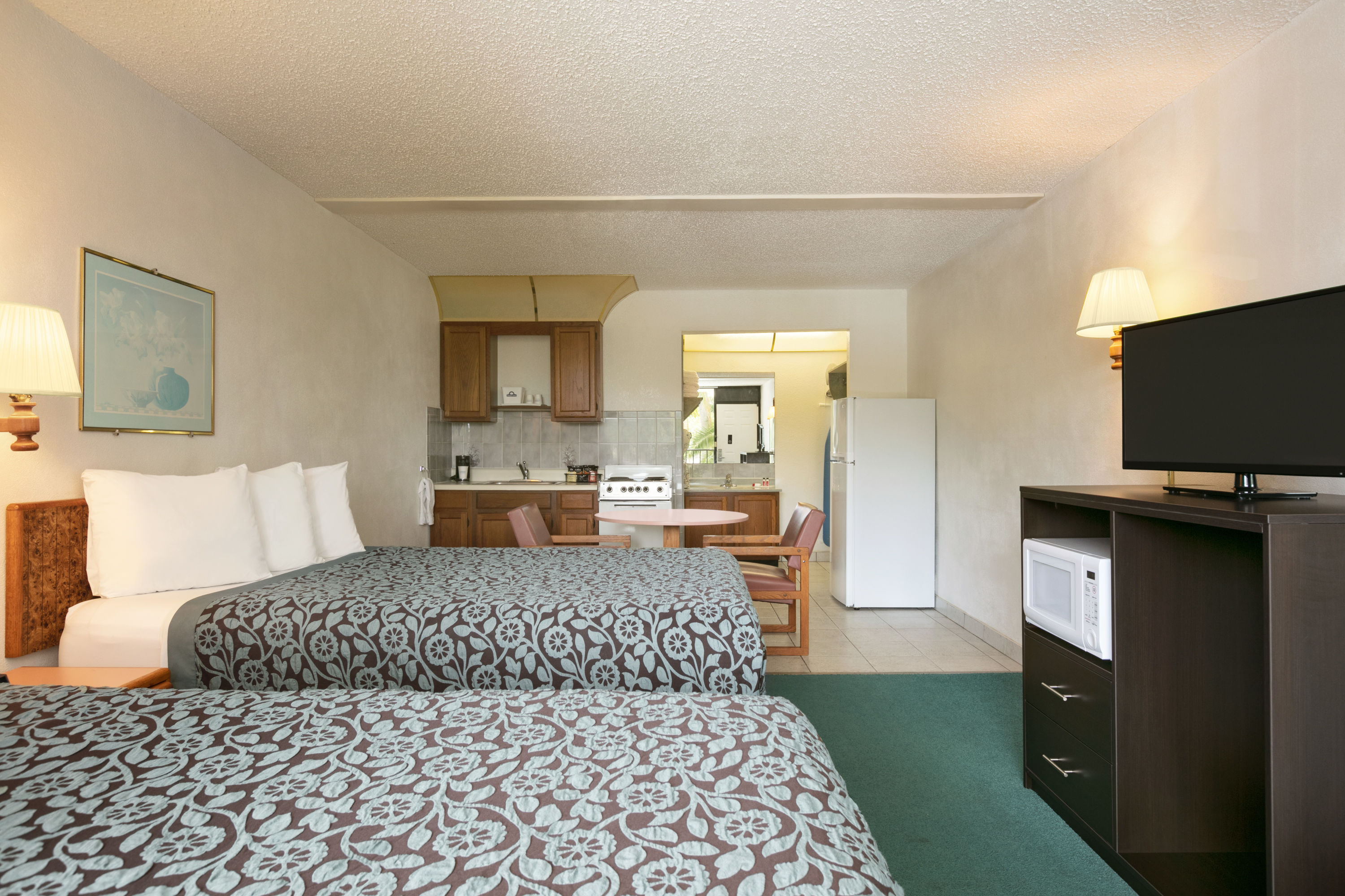 Double bed guest room at the Days Inn by Wyndham Clearwater/Gulf to Bay in Clearwater, Florida