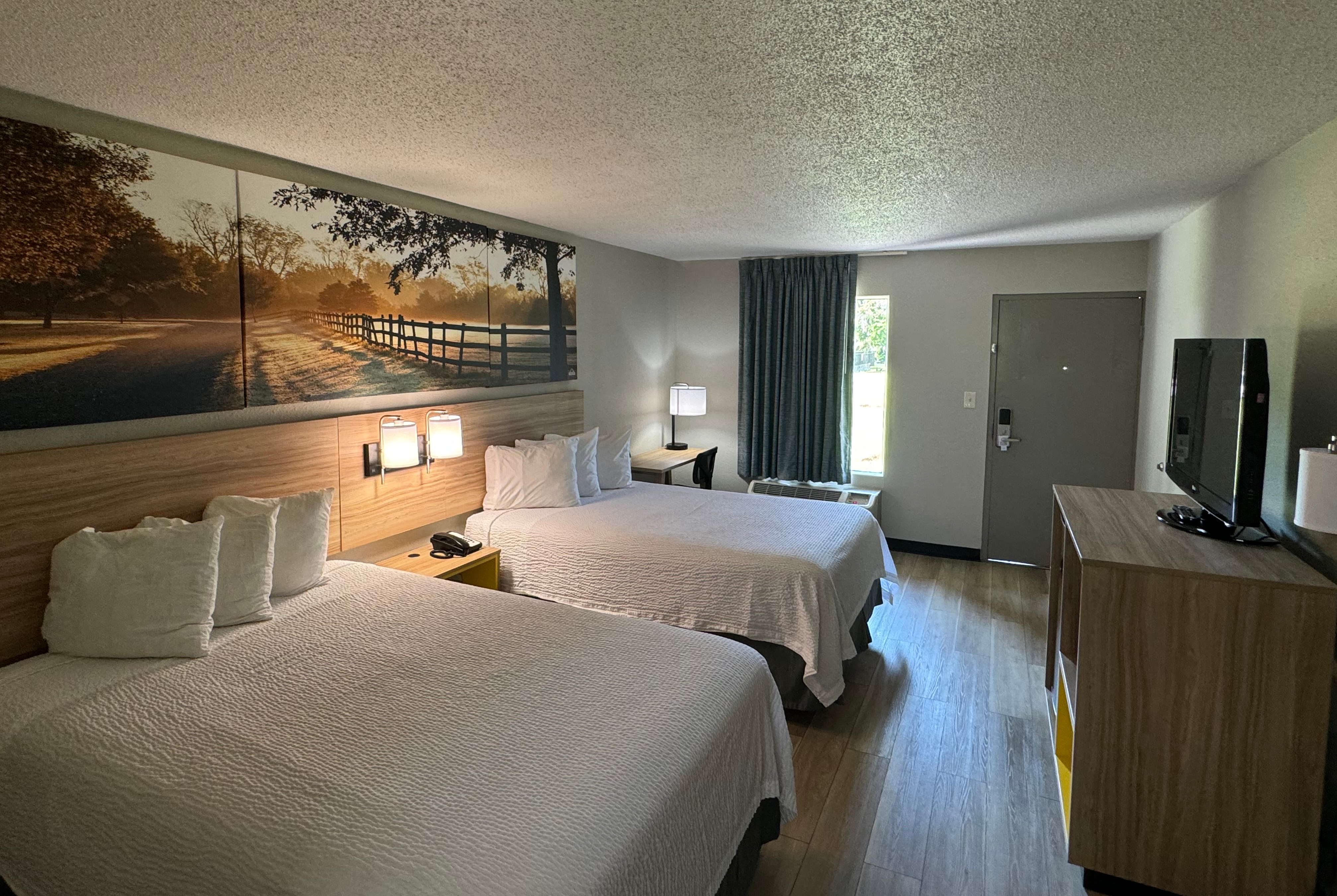 Guest room at the Days Inn by Wyndham Crystal River in Crystal River, Florida