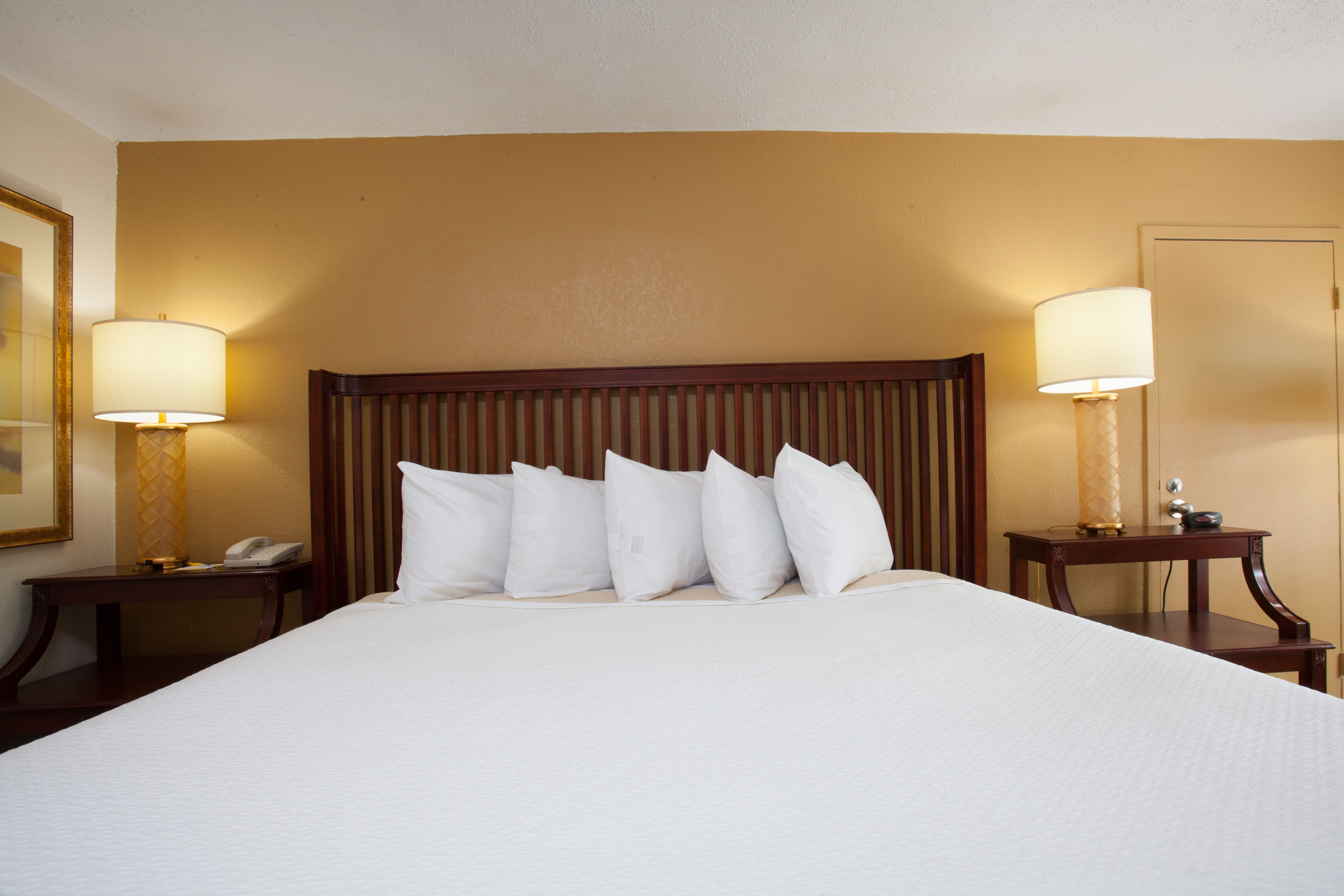 Guest room at the Days Inn by Wyndham Daytona Beach Speedway in Daytona Beach, Florida