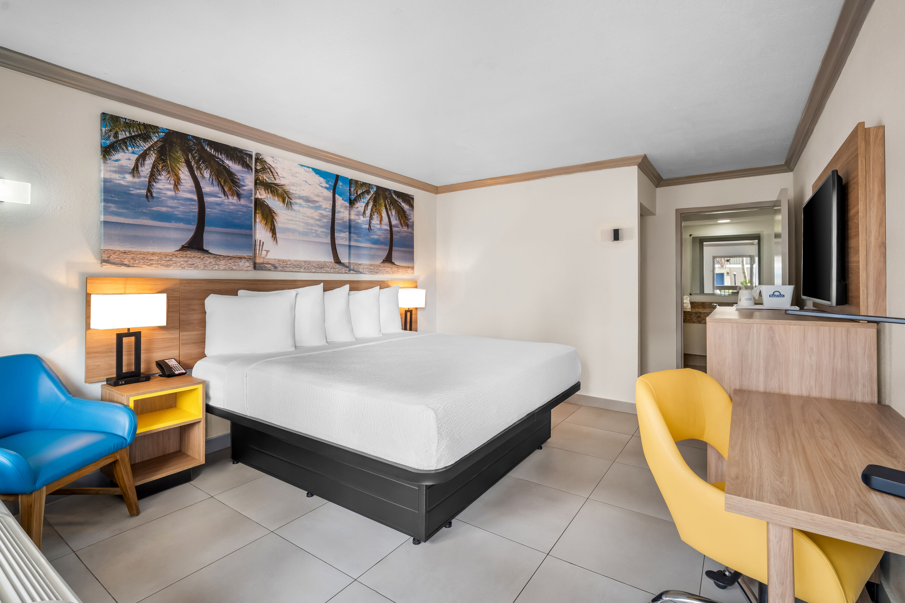 King bed guest room at the Days Inn by Wyndham Florida City in Florida City, Florida