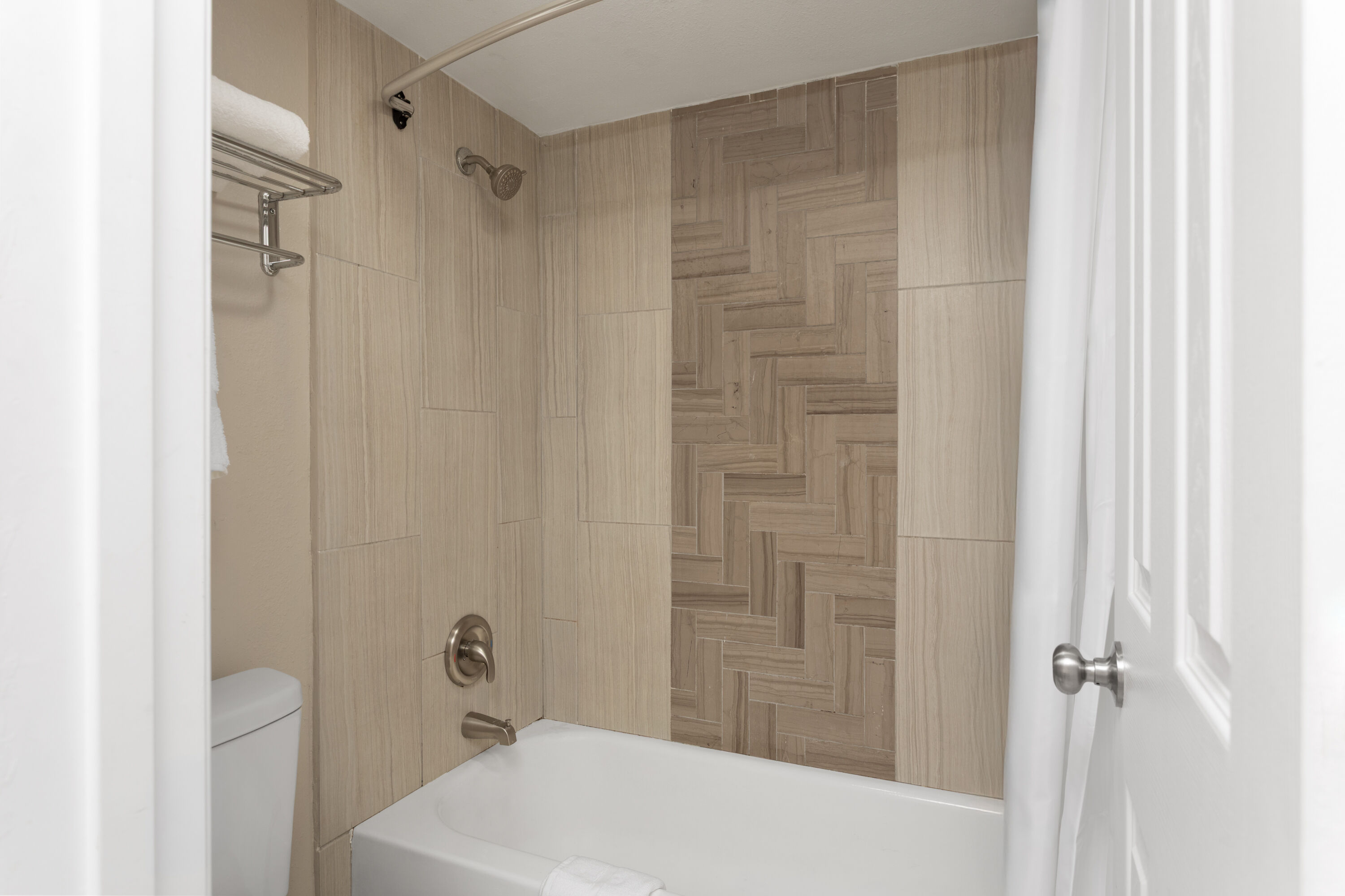 Guest room bath at the Days Inn by Wyndham Fort Myers Springs Resort in Fort Myers, Florida