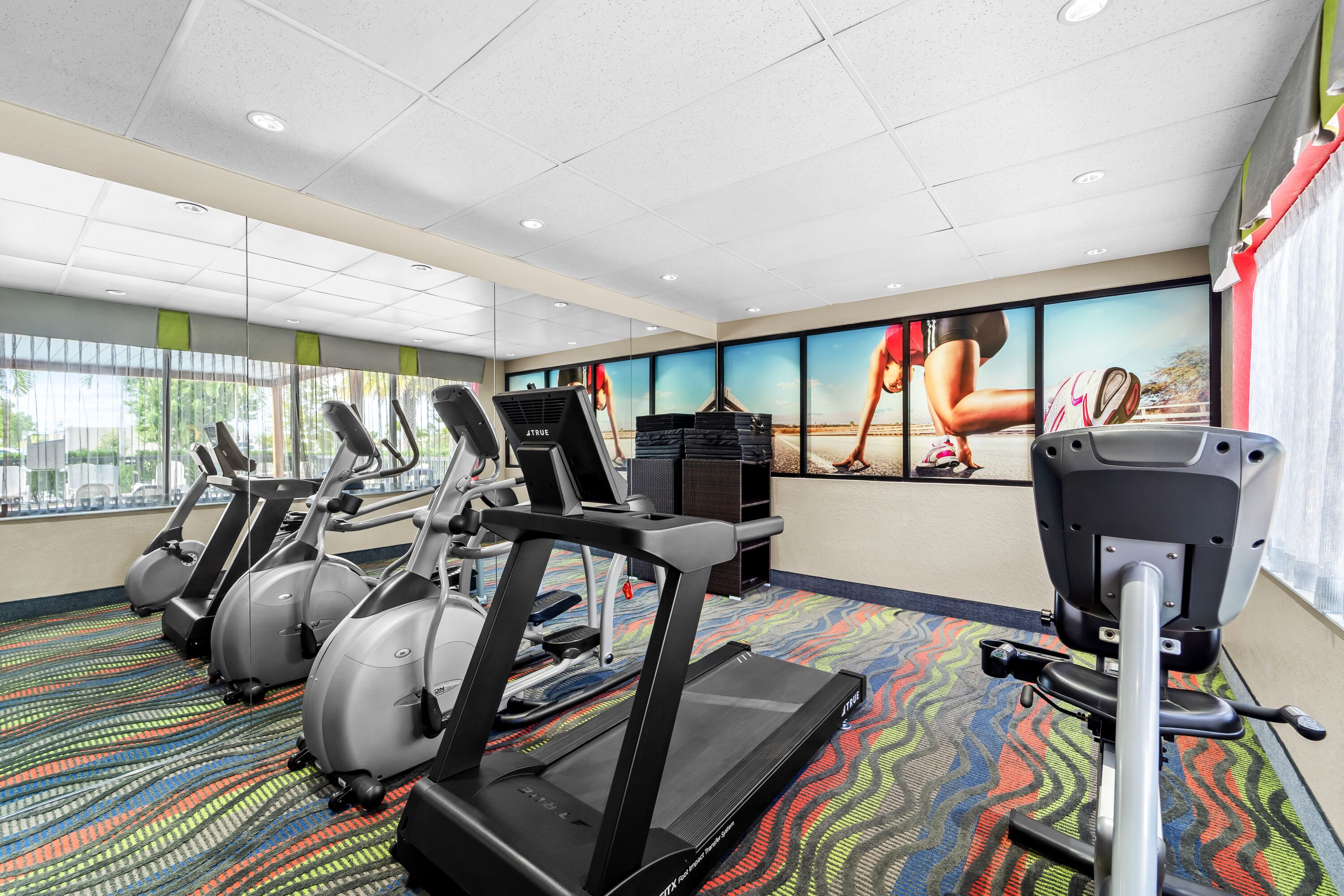 Fitness room at Days Inn & Suites by Wyndham Fort Myers Near JetBlue Park in Fort Myers, Florida