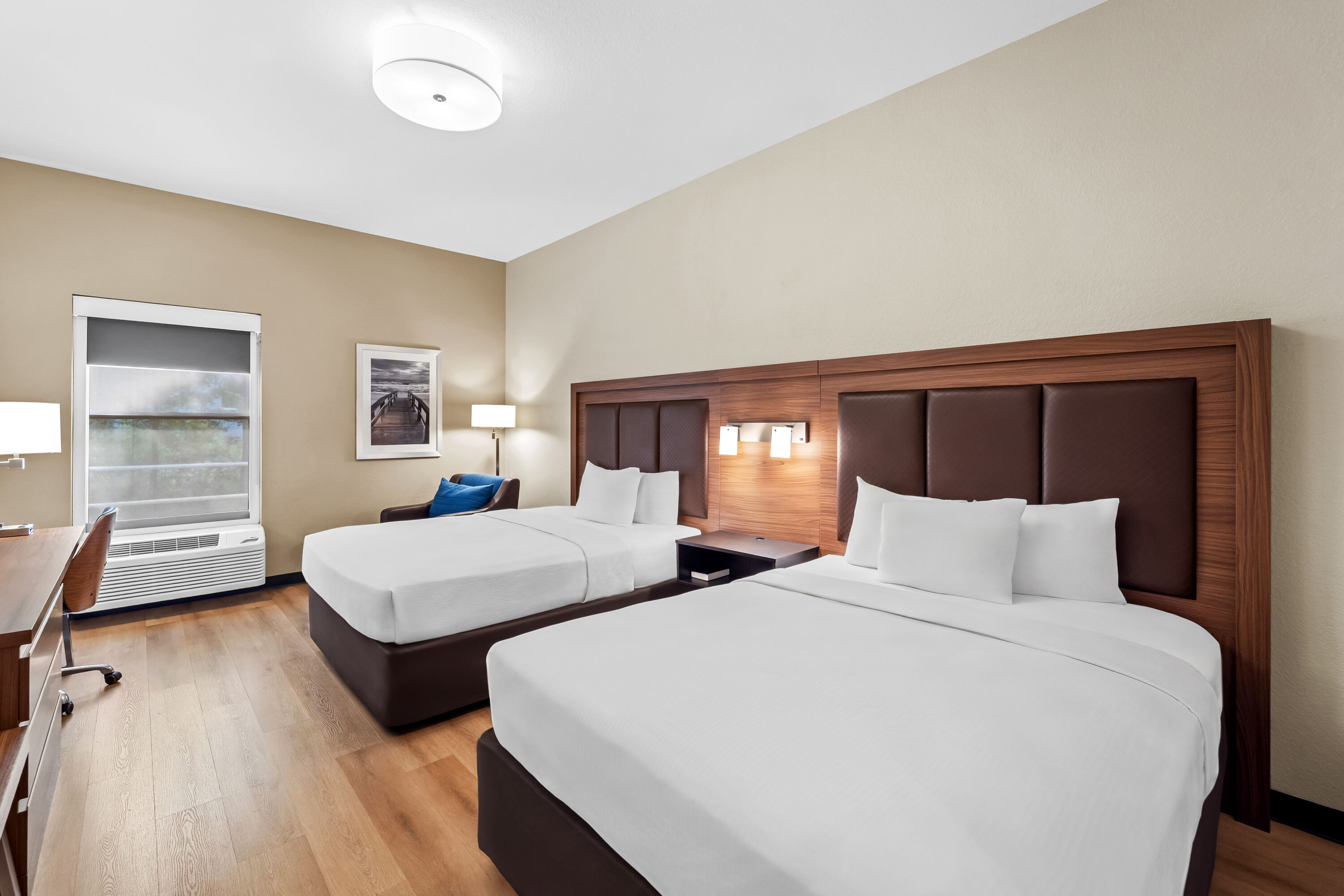 Double bed guest room at the Days Inn & Suites by Wyndham Fort Myers Near JetBlue Park in Fort Myers, Florida