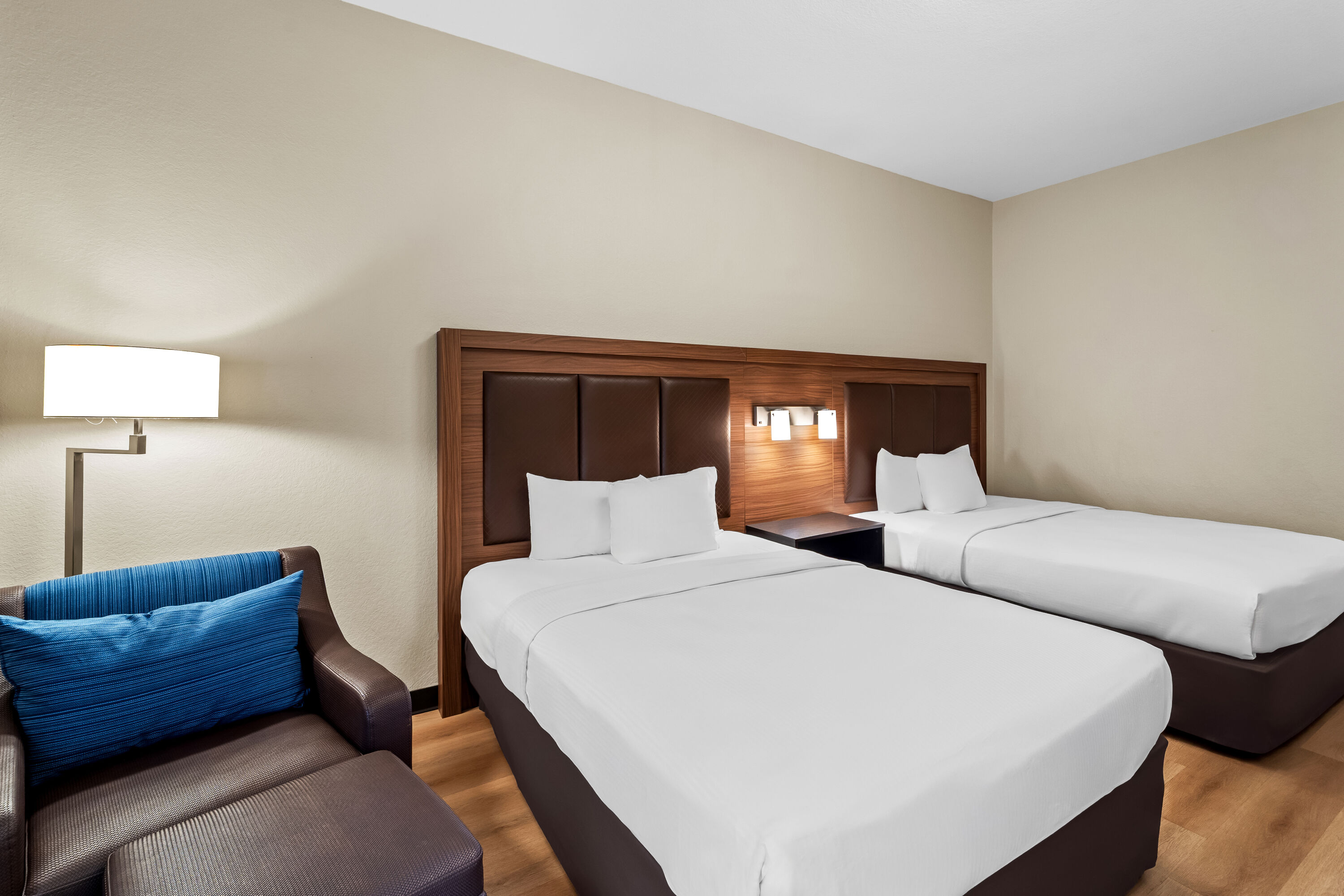 Double bed guest room at the Days Inn & Suites by Wyndham Fort Myers Near JetBlue Park in Fort Myers, Florida