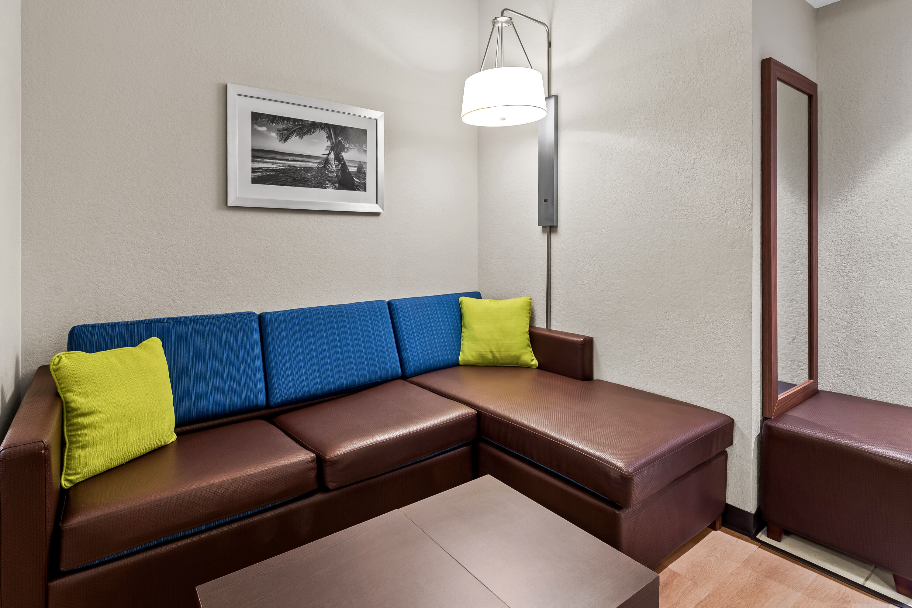 King bed guest room at the Days Inn & Suites by Wyndham Fort Myers Near JetBlue Park in Fort Myers, Florida