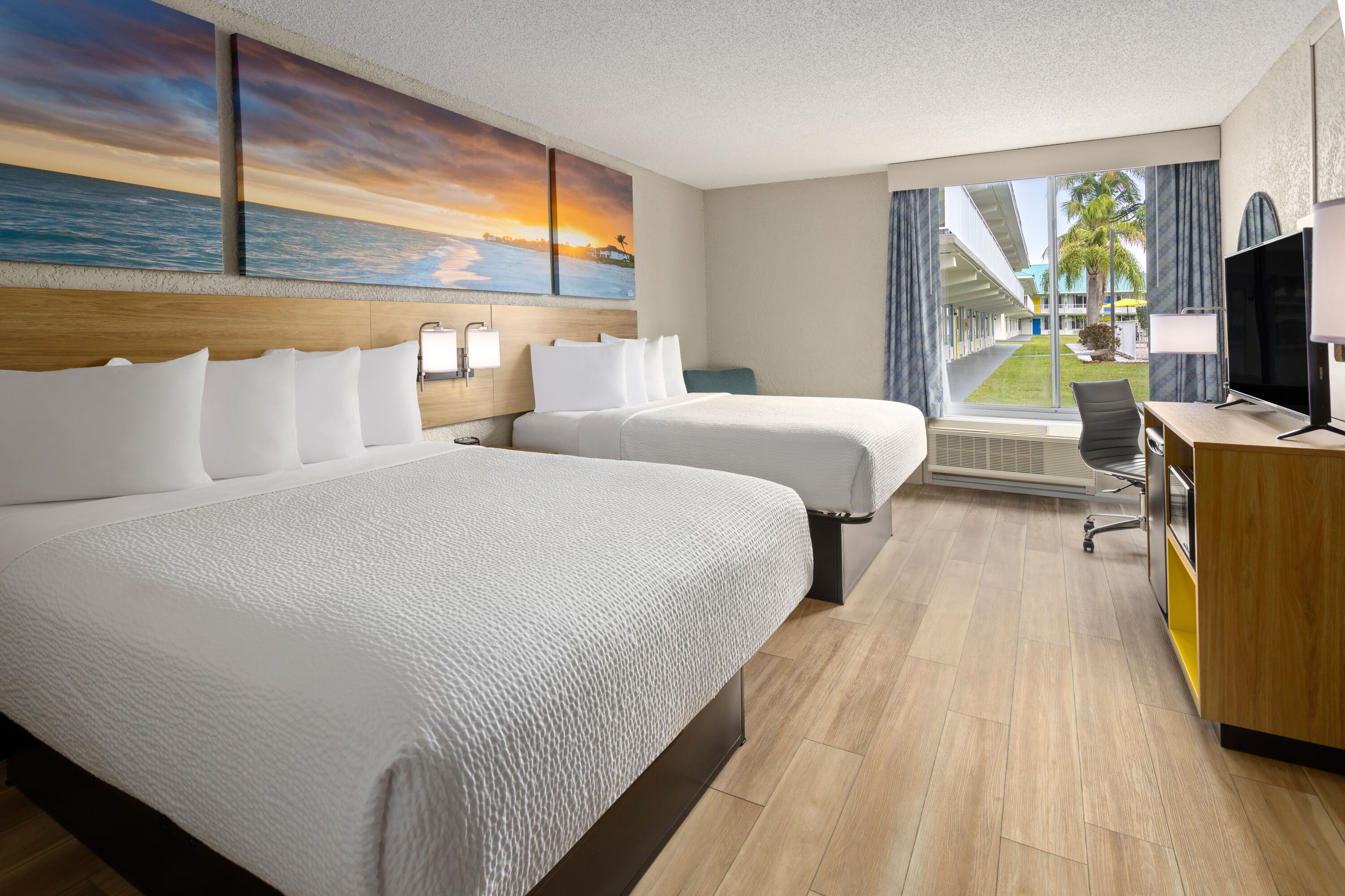 Guest room at the Days Inn & Suites by Wyndham Fort Pierce Midtown in Fort Pierce, Florida
